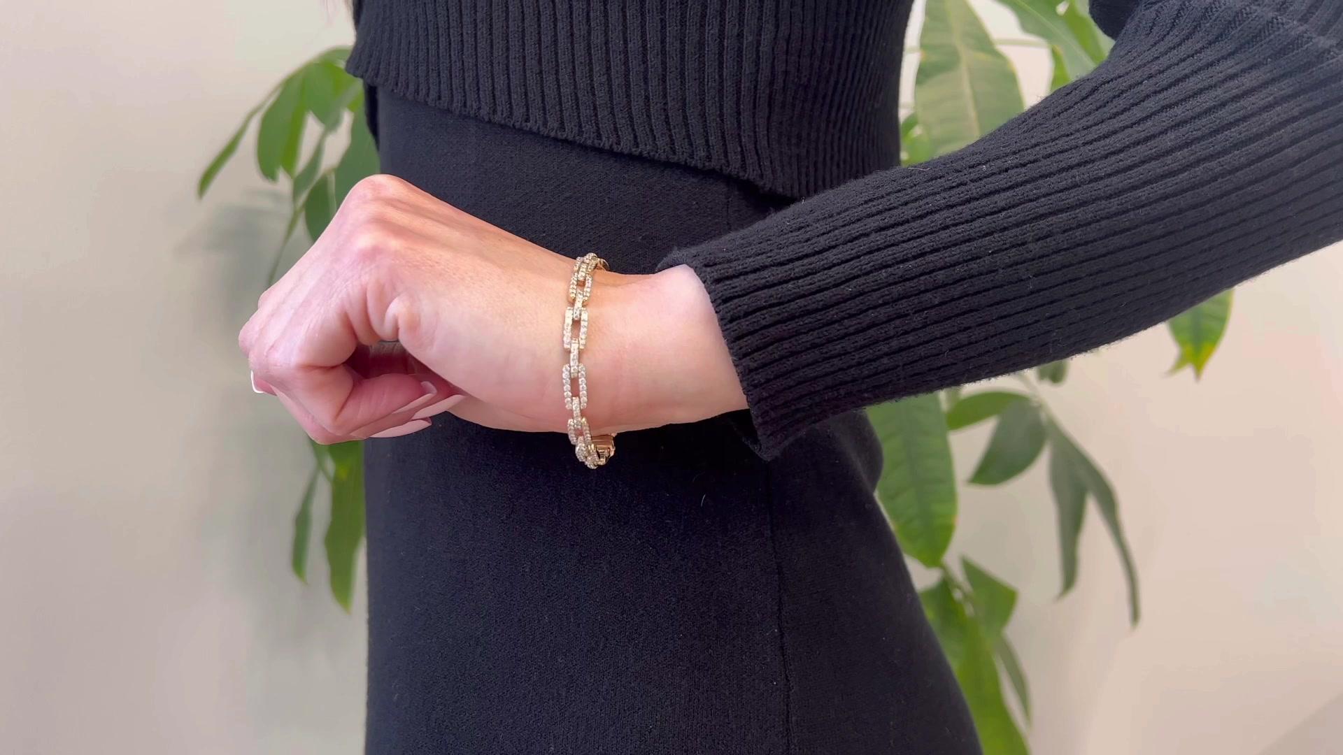 Gliederarmband aus 14 Karat Gelbgold mit Diamanten (Brillantschliff)