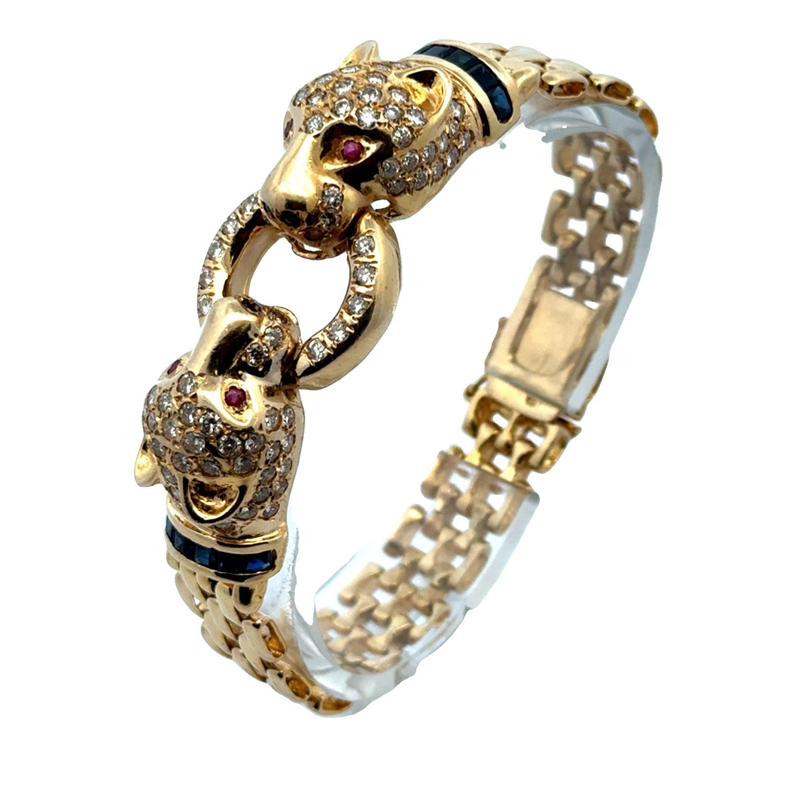 Modern Diamond 14 Karat Yellow Gold Panther Bracelet Accent Rubies & Sapphires For Sale