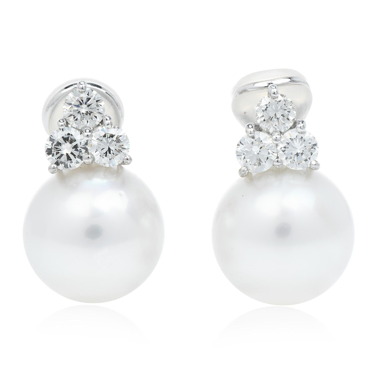 Looking to match a strand of pearls with an Exceptional Size & Luster Earrings? 

Here is your perfect pair. 

Crafted in solid 18K white gold, they have 2 Fine South Sea Pearls, 14.5 mm, perfectly round with white-silver undertones, high luster &