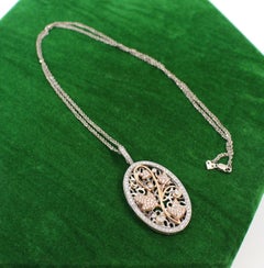 Diamond and 14-Carat Gold Oval Locket on Chain