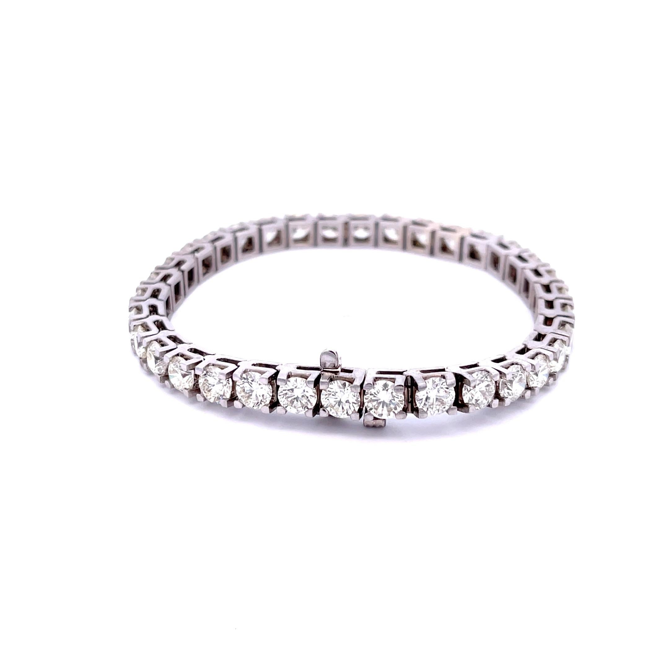 Diamond Tennis Bracelet in 14K White Gold. The bracelet features 34 brilliant round diamonds with 14ctw, I-K color, VS2-SI2 clarity. The bracelet is 7