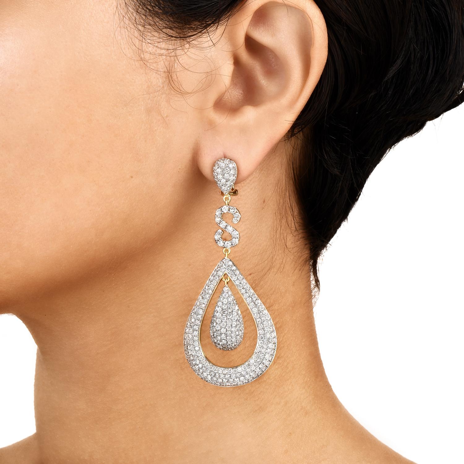 Dazell your night with these stylish diamond dangle drop earrings

They are finely hand-crafted in 14 K Yellow & White Gold. Enhanced by  Genuine Diamond, round Cut, pave prong set, all weighing collectively 5.70 carats, G-H color, SI clarity.