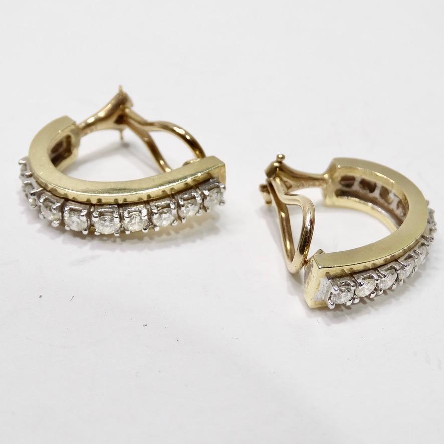 These 14K gold diamond hoops circa 1980s are going to become your next go-to earring! 9 round diamonds are arranged alongside a stunning 14K yellow gold to create these gorgeous staple hoop earrings. The classic style and perfect size of these