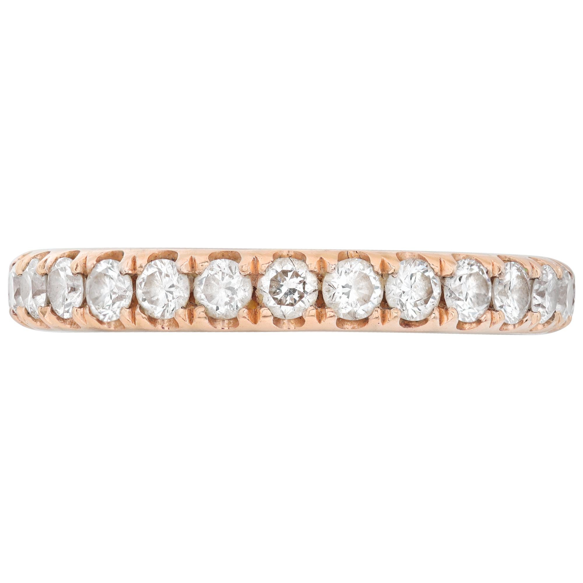 Diamond eternity band in 14k rose gold with 27 round brilliant cut diamonds, approximately 1.08 carats in G-H color, VS clarity diamonds. Size 5.

This Diamond ring is currently size 5 and some items can be sized up or down, please ask! It weighs