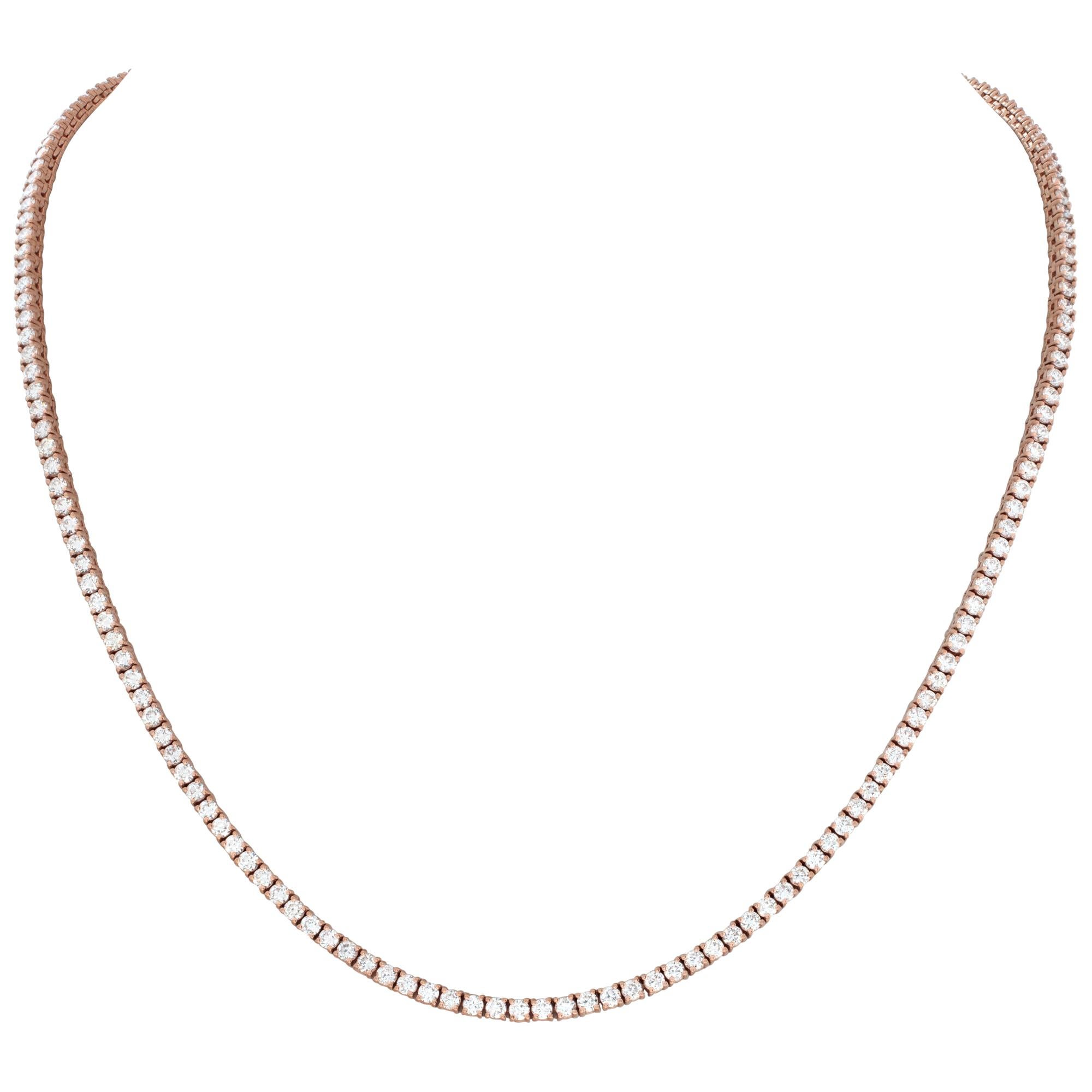 Diamond tennis necklace in 14k rose gold with 6.45 carats in diamonds H-I color and SI clarity. Measures 16 inch length, width 2.5mm.