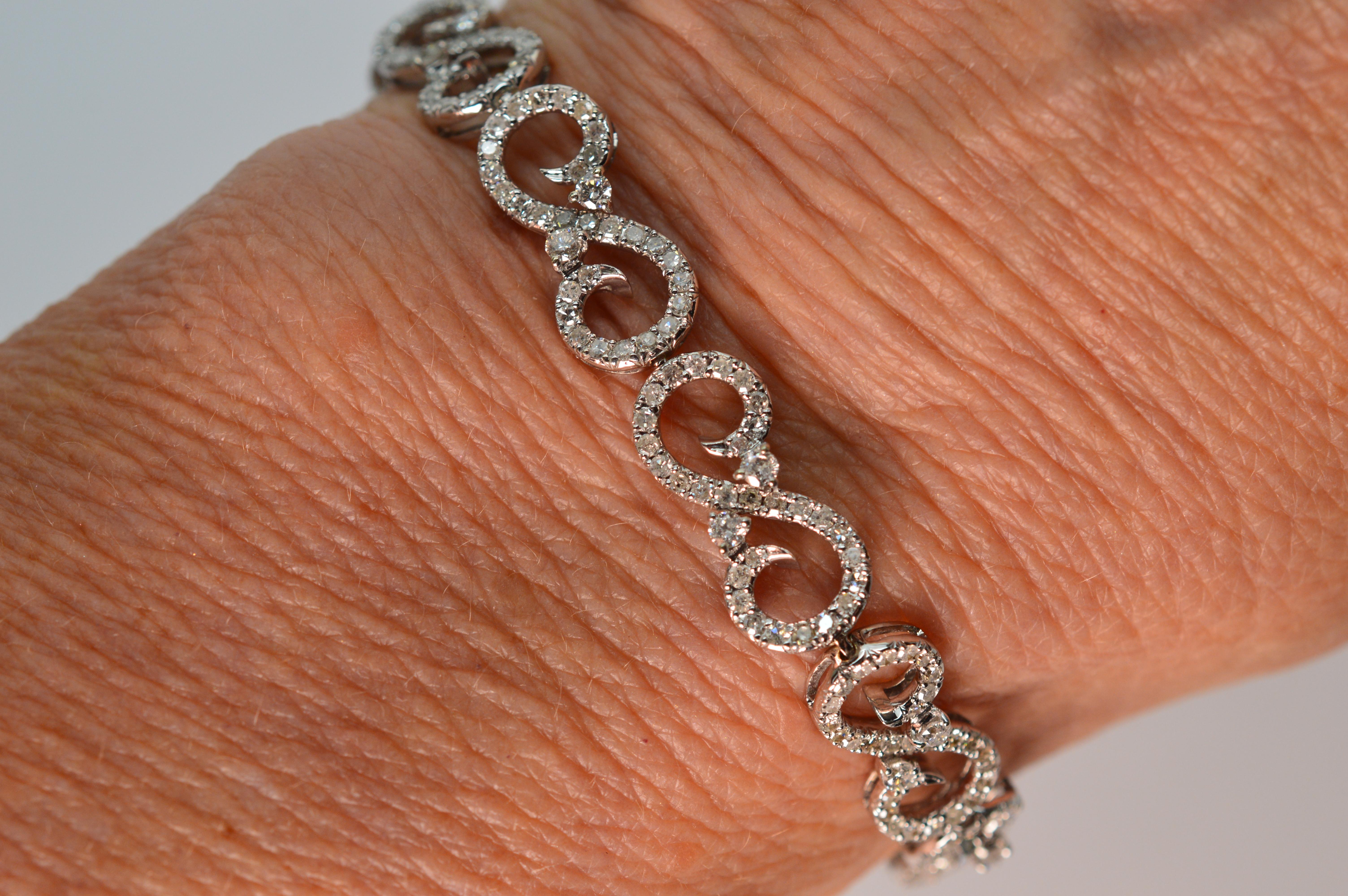 Round Cut Diamond 14K White Gold Fancy Swirl Link Bracelet For Sale