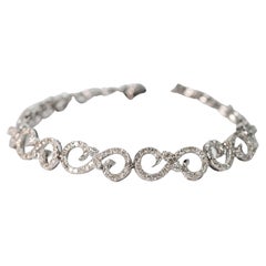 Bracelet à maillons en forme de tourbillon en or blanc 14 carats avec diamants fantaisie