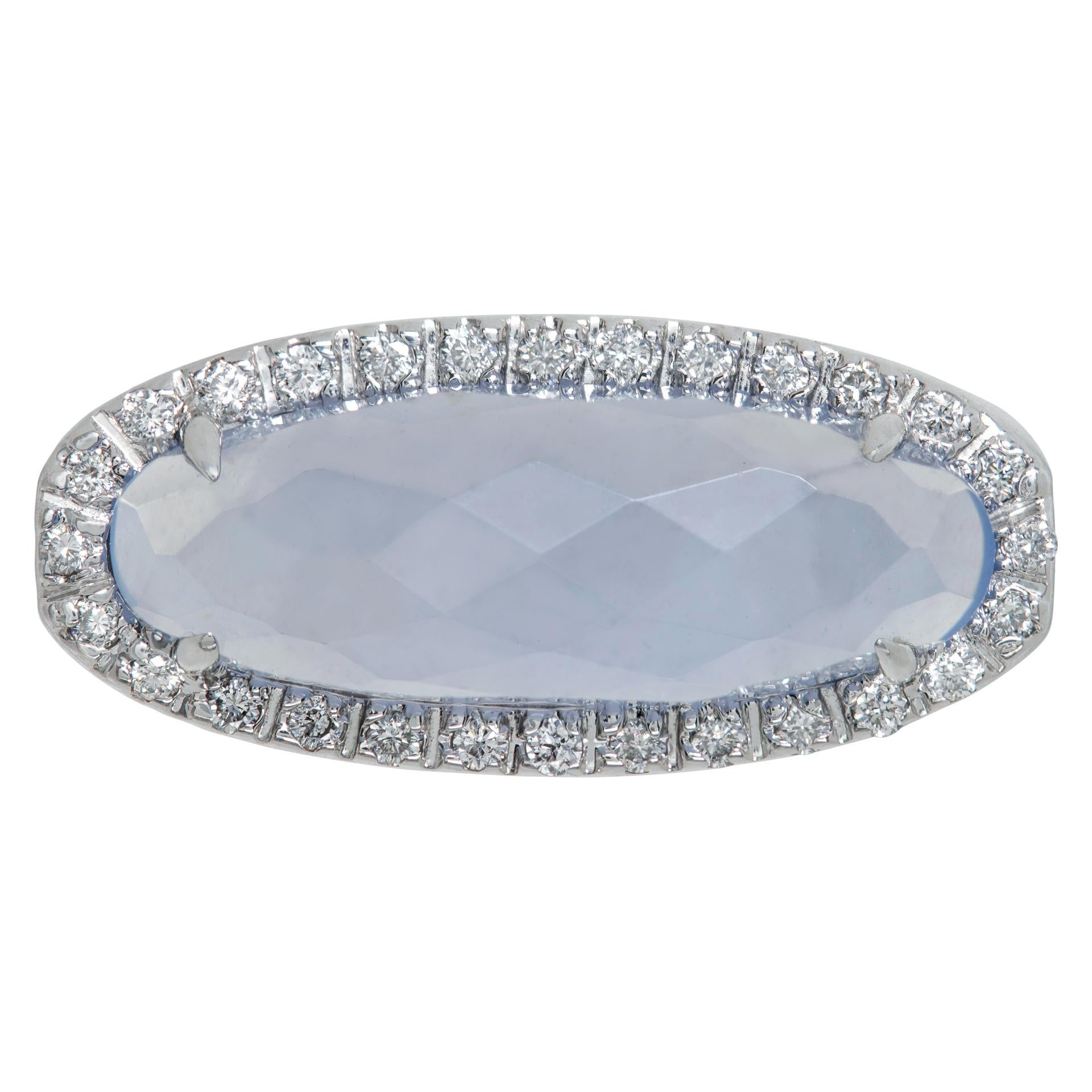 Oval Faceted Ring with approx. 0.50 ct of diamonds bezel mounted around center Chalcedony in 14k white gold. Size 6.

This Diamond ring is currently size 6 and some items can be sized up or down, please ask! It weighs 4.5 pennyweights and is 14k.