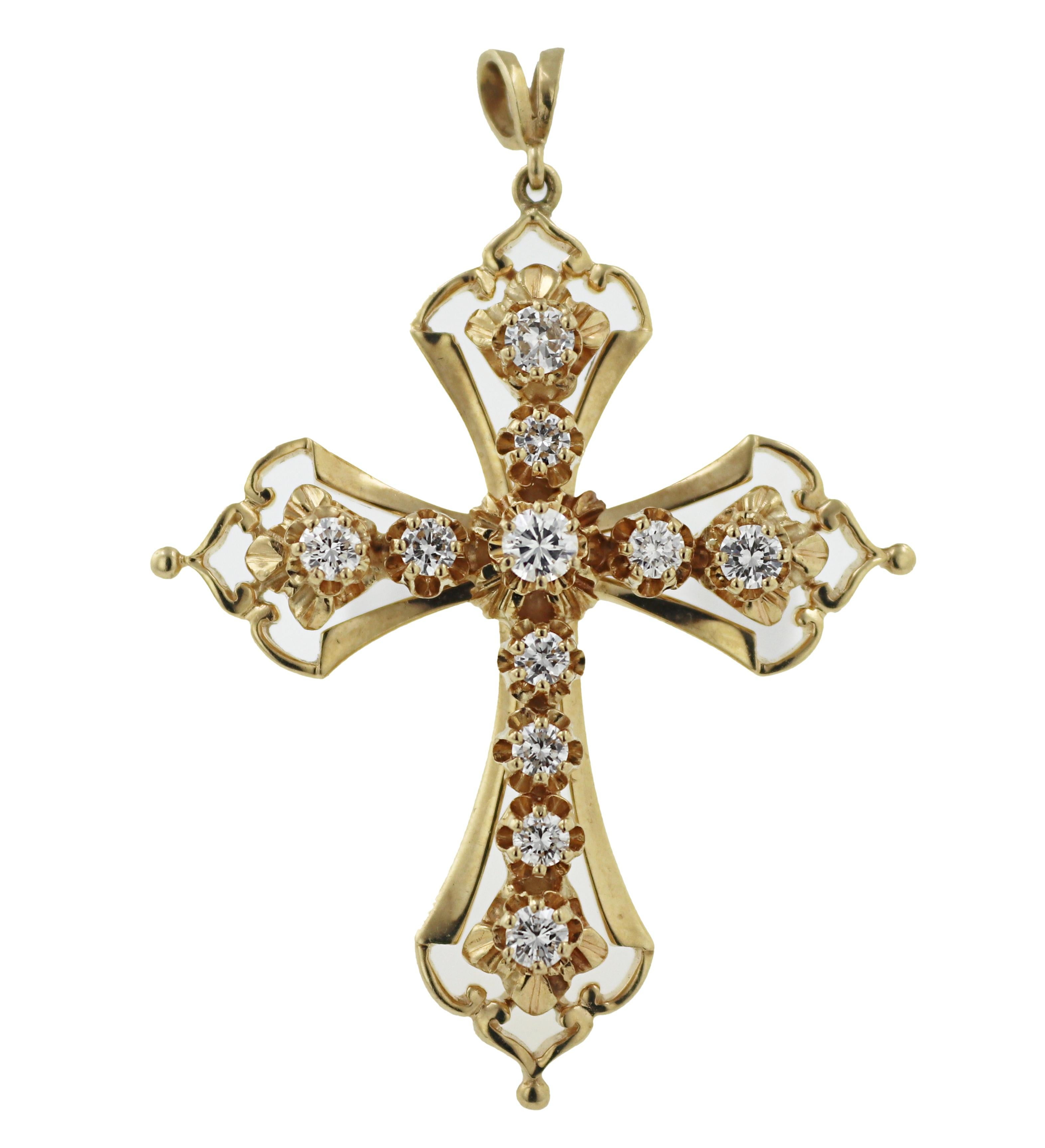 Featuring eleven full-cut diamonds, 1.15 cts., tw., SI, H-J, each set in 14k
yellow gold, cast, raised tulip settings, cross mounting, 54.8 (with bail) X
39.4 X 8.6 mm, Gross Weight 11.76 grams.