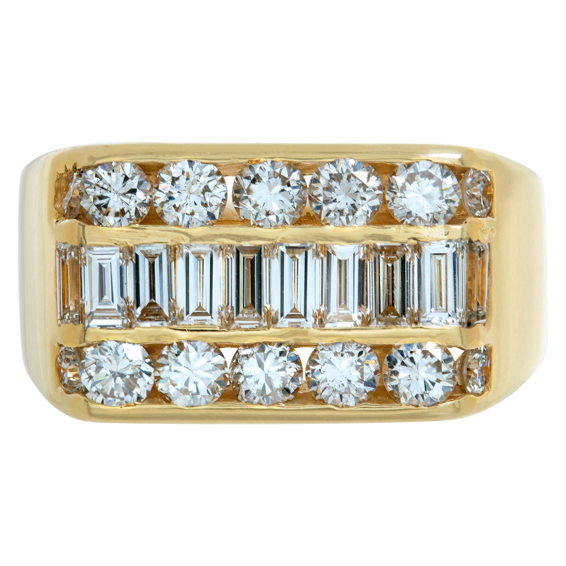 Baguette & round brilliant cut diamonds ring in 14K yellow gold. Baguettes & round brilliant cut diamonds total approx. weight: 3.30 carats, estimate: H color, VS-SI clarity. Center measurements: 18 x 12 mm (3/4 x 3/8