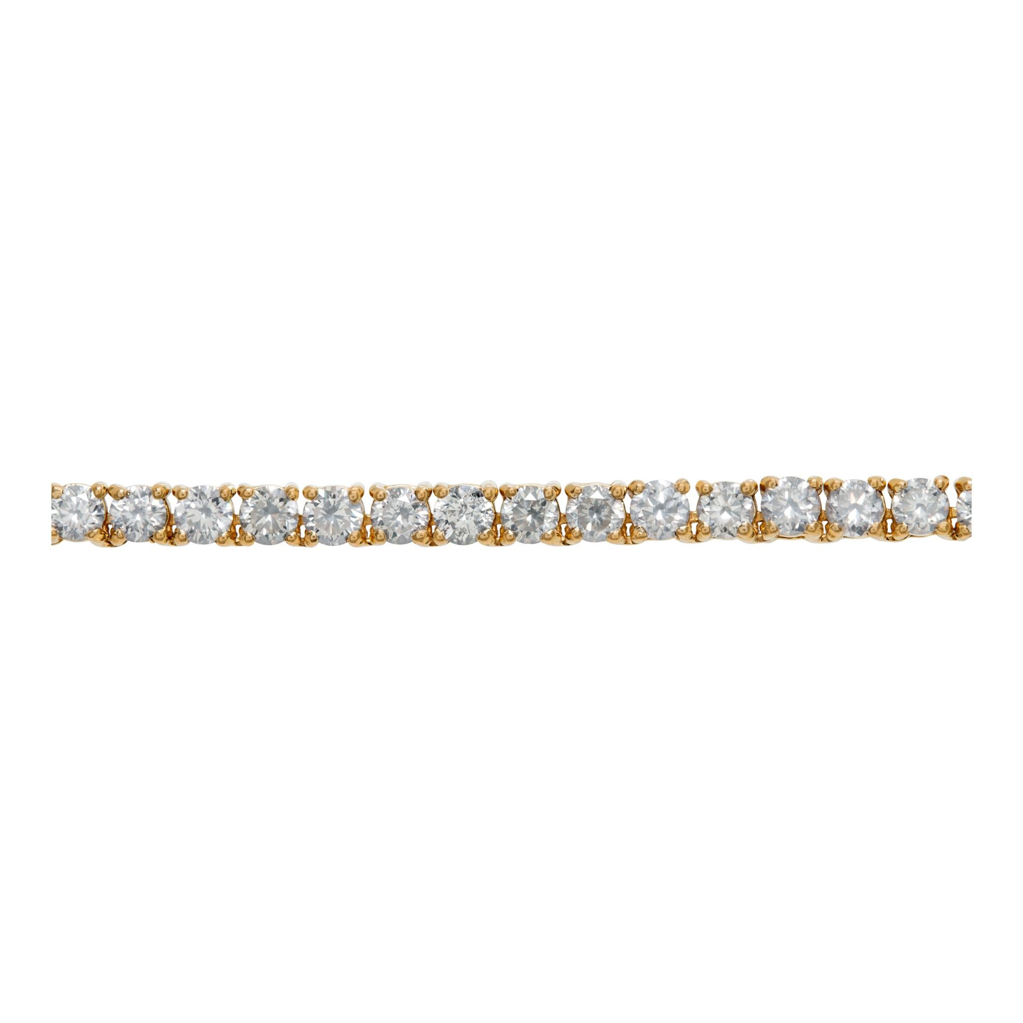 Classic and elegant diamond tennis necklace with over 6.50 carats in G-H color, VS-SI clarity  4 prong set diamonds all in 14k yellow gold. Length 16 inches. Width 2.8mm.