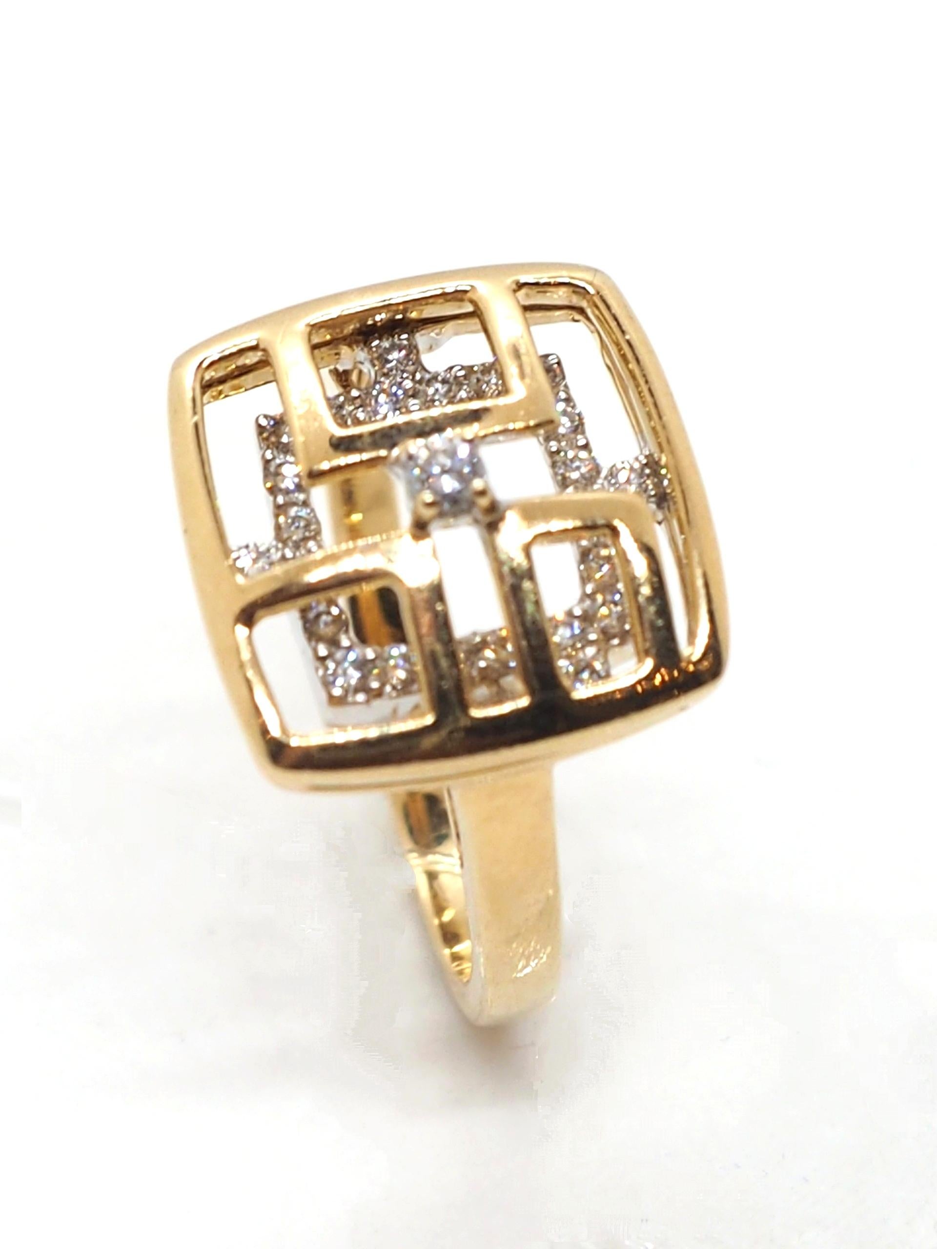 Diamond cocktail ring crafted in solid 14 Karat two tone gold, geometric square shape.

Elevate your style with our chic modern fashion ring, meticulously crafted in 14k yellow and white gold and adorned with a total of 0.5 carats of dazzling