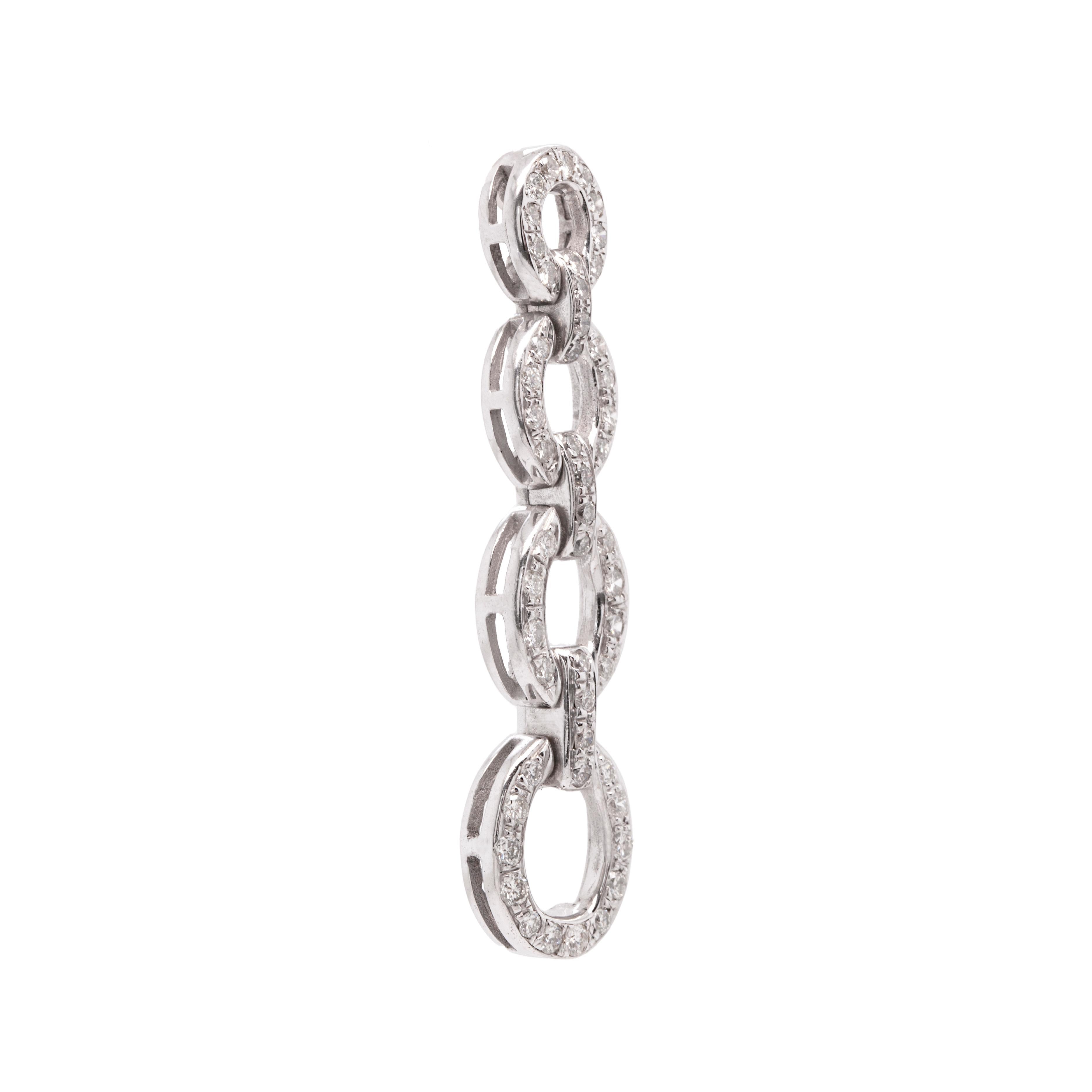 These exquisite 18 carat white gold earrings feature 4 graduating oval shaped links, beautifully alternating with bar links, all pavé set with fine quality round brilliant cut diamonds totalling to approximately 2.20ct. The delicate movements of the