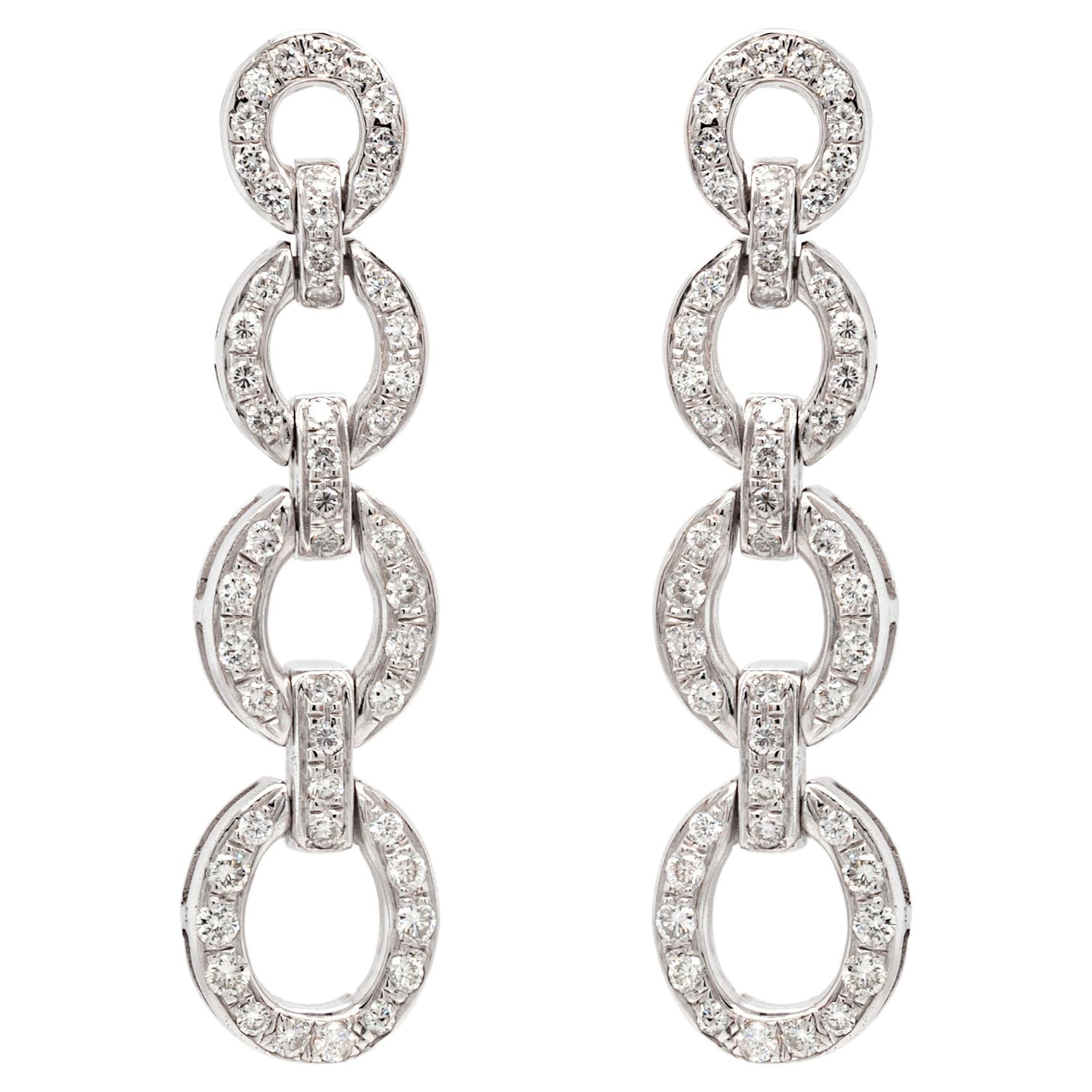Orecchini pendenti circolari con diamante in oro bianco a 18 carati in vendita