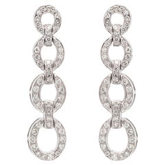Boucles d'oreilles à maillons circulaires gradués en or blanc 18 carats avec diamants