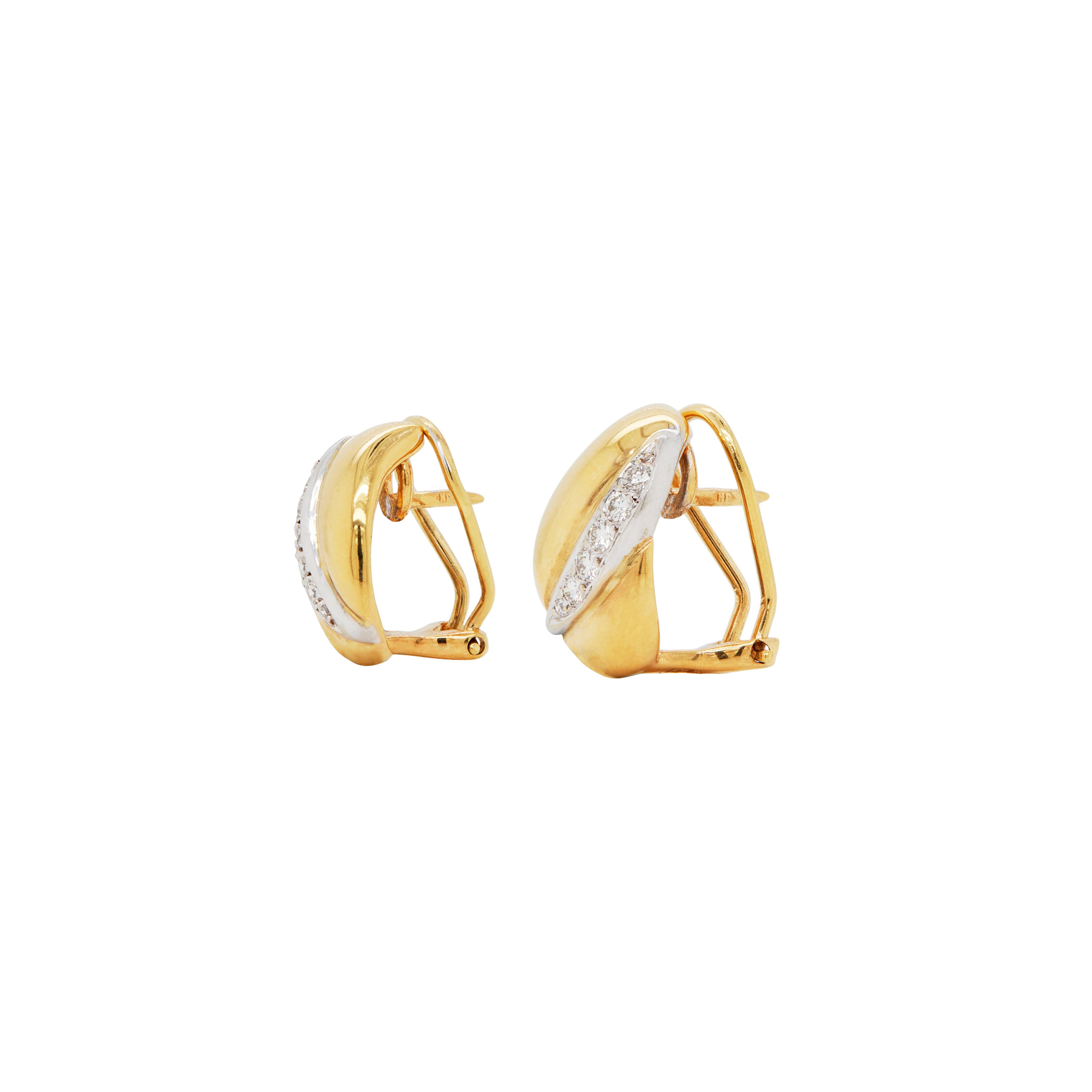This chic pair of two tone huggie earrings is a stylish choice for everyday wear, masterfully crafted in luxurious 18 carat yellow and white gold.

Simple yet elegant, each earring features a classic design centred by an oblique tapered white gold