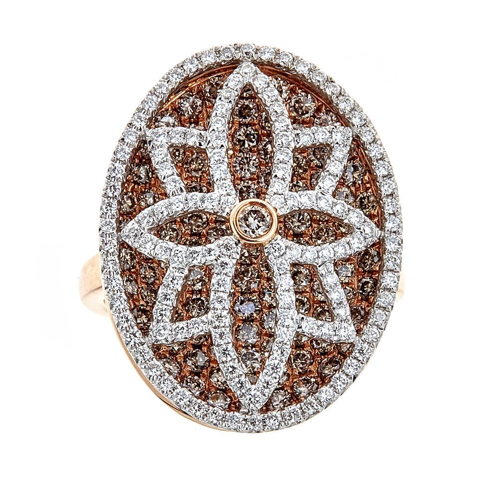 18 Karat Gold 2.25 Carat Diamond Oval Shape Ring Fine Jewelry By Gregg Ruth

Take her breath away with this oval-shaped diamond ring. Encrusted with white and chocolate diamonds of high quality. White diamonds are composing a flower design, and