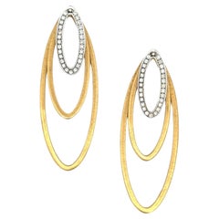 Boucles d'oreilles modernes avec pendants ovales en or bicolore 18 carats et diamants