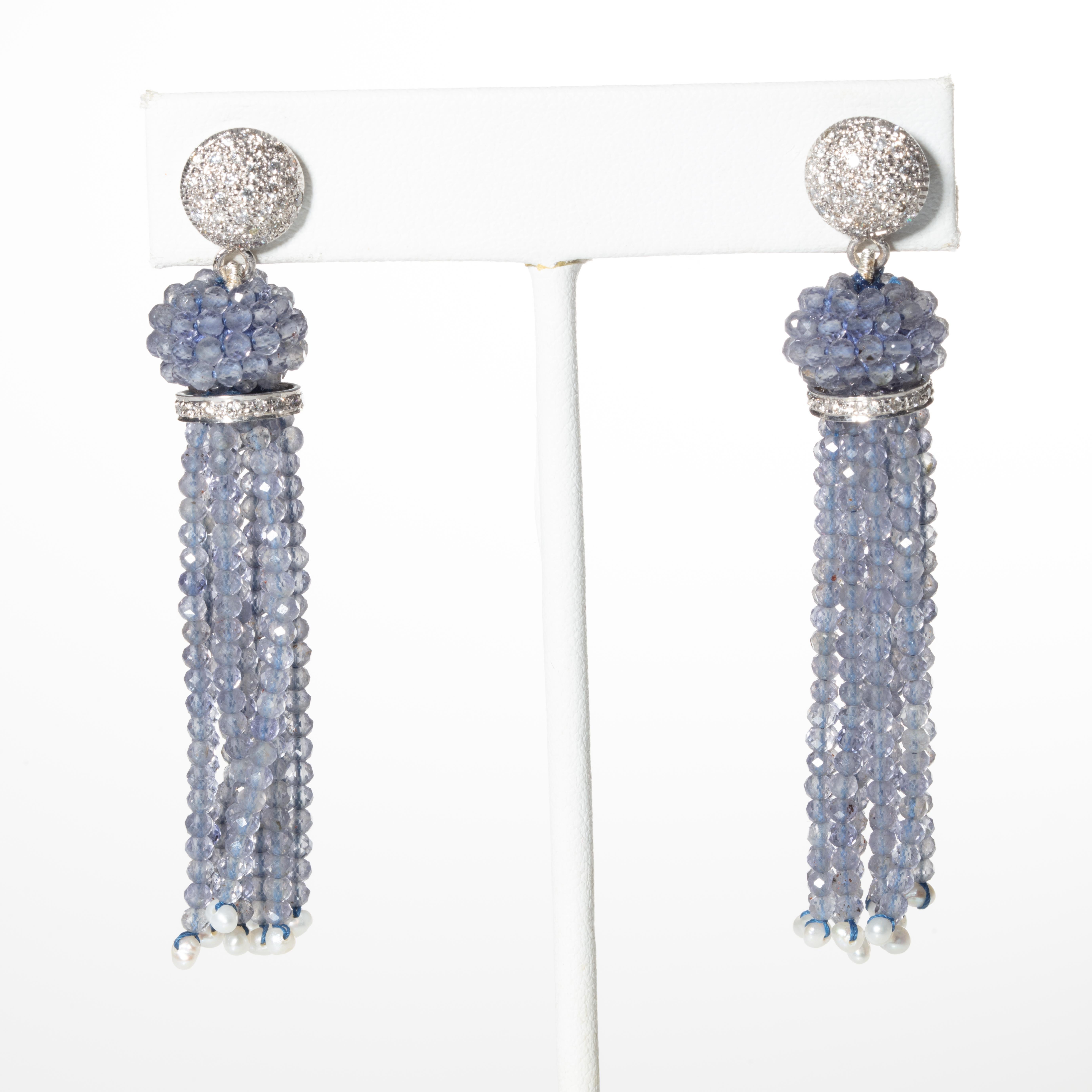 Faceted Iolite tassel earrings with 18K white gold and diamond rondelle and earring post.  Seed pearls at the bottom.  For pierced ears.  Designed by Deborah Lockhart Phillips