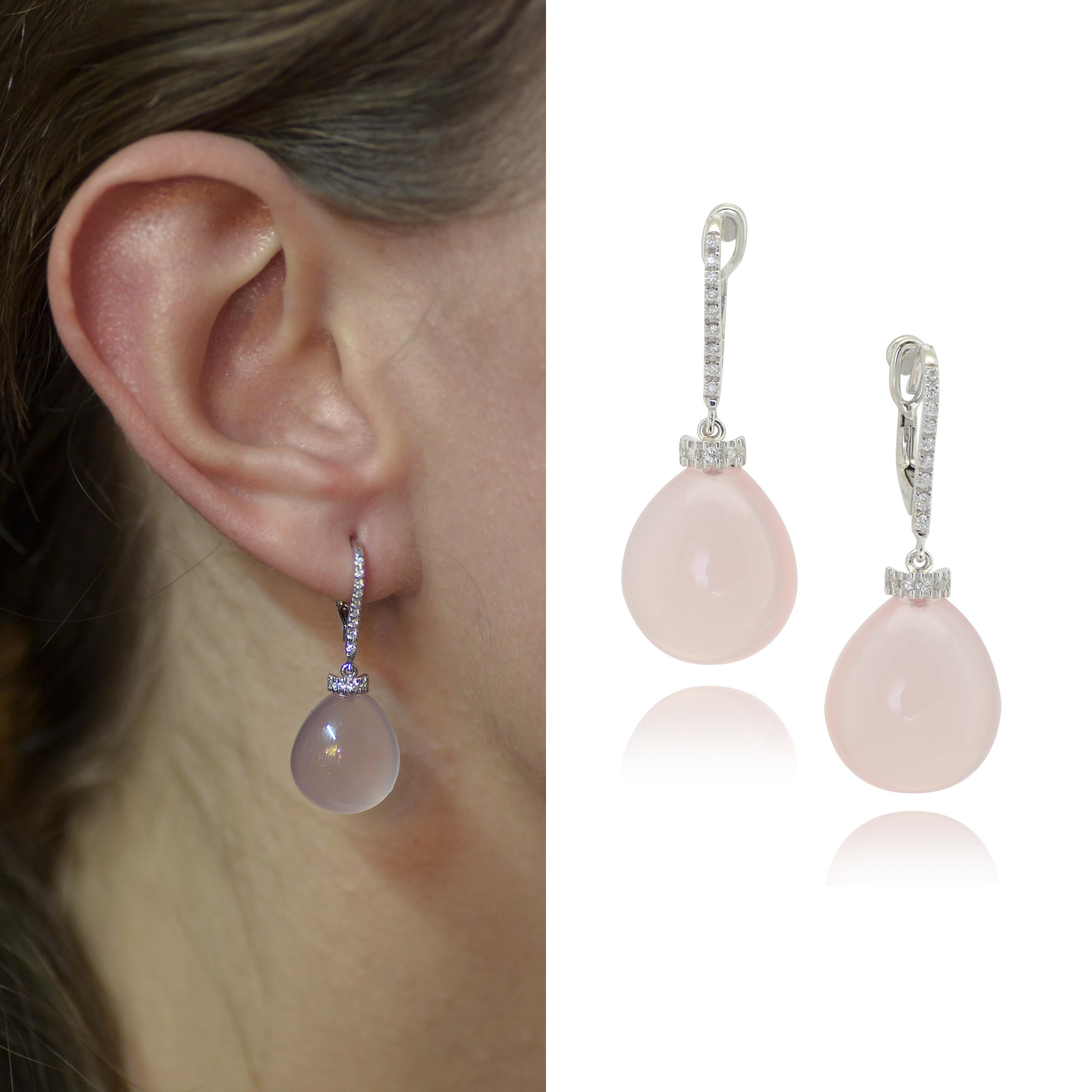 Handcrafted in Margherita Burgener family workshop, based in Italy,  the Gattopardo earrings are characterized by a cabochon cut pendant drop in pink quartz and a hook set by high quality diamonds , 

Inspired by the scene of Claudia Cardinale