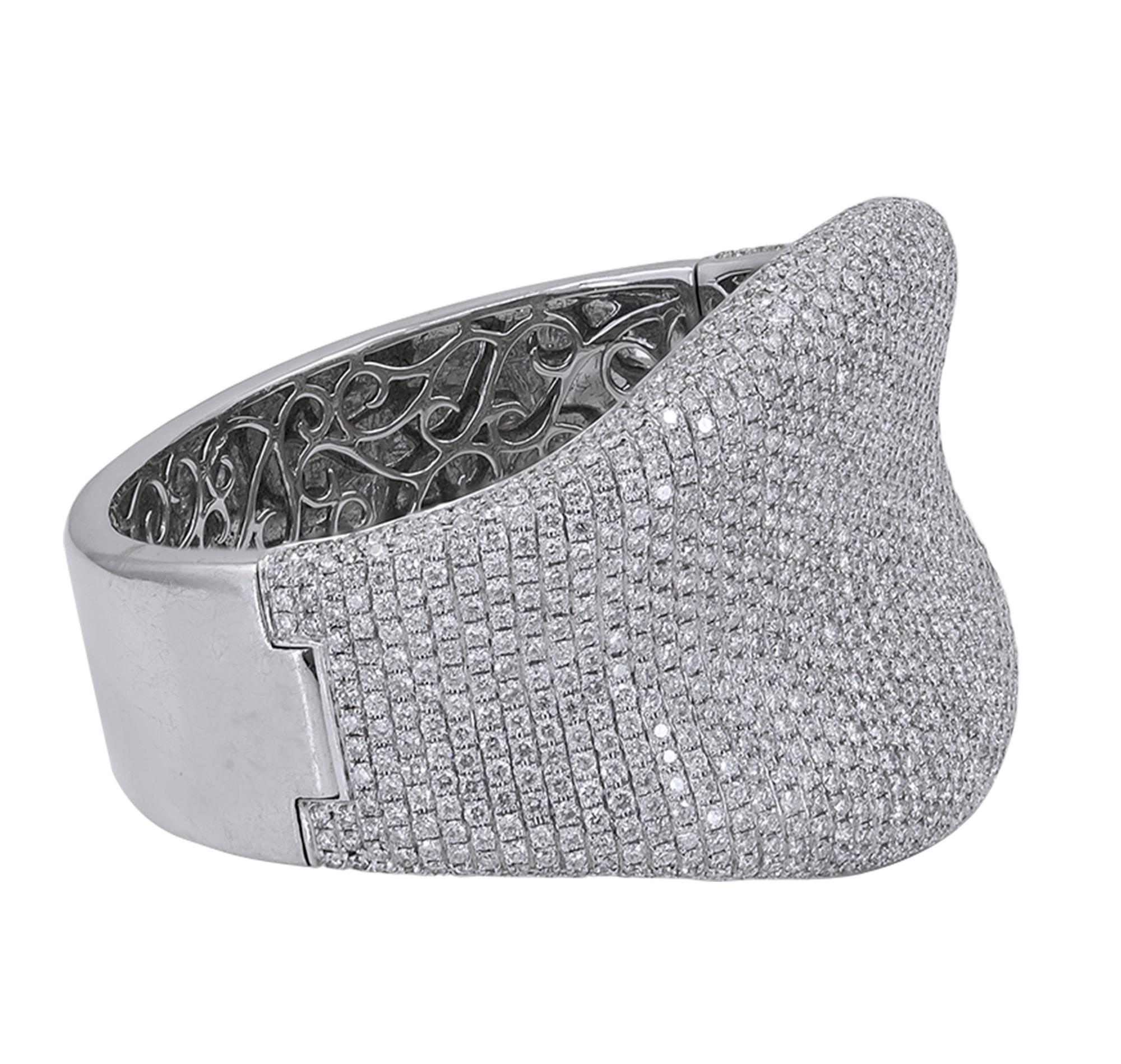 One cannot help but want to get a closer look at the beguiling texture of this cuff bracelet. The bewitching Diamond Pavé Cuff Bracelet made by Spectra Fine Jewelry in the Contemporary era, 2019, is crafted in 18K white gold and embellished on the