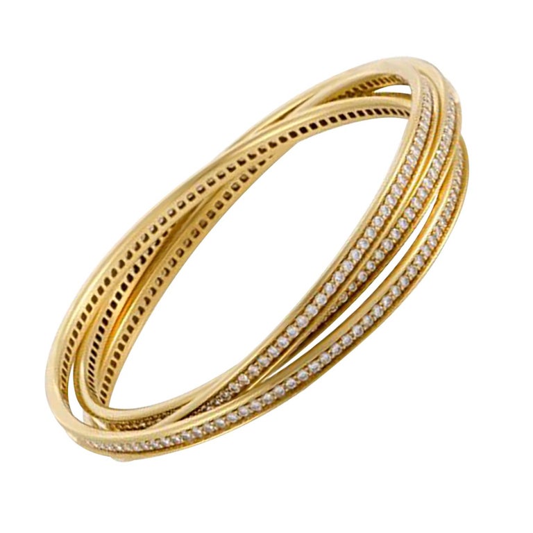 Cartier Bracelet à trois anneaux Trinity en or jaune 18 carats et diamants  En vente sur 1stDibs | bracelet 3 anneaux cartier prix, 3 anneaux cartier