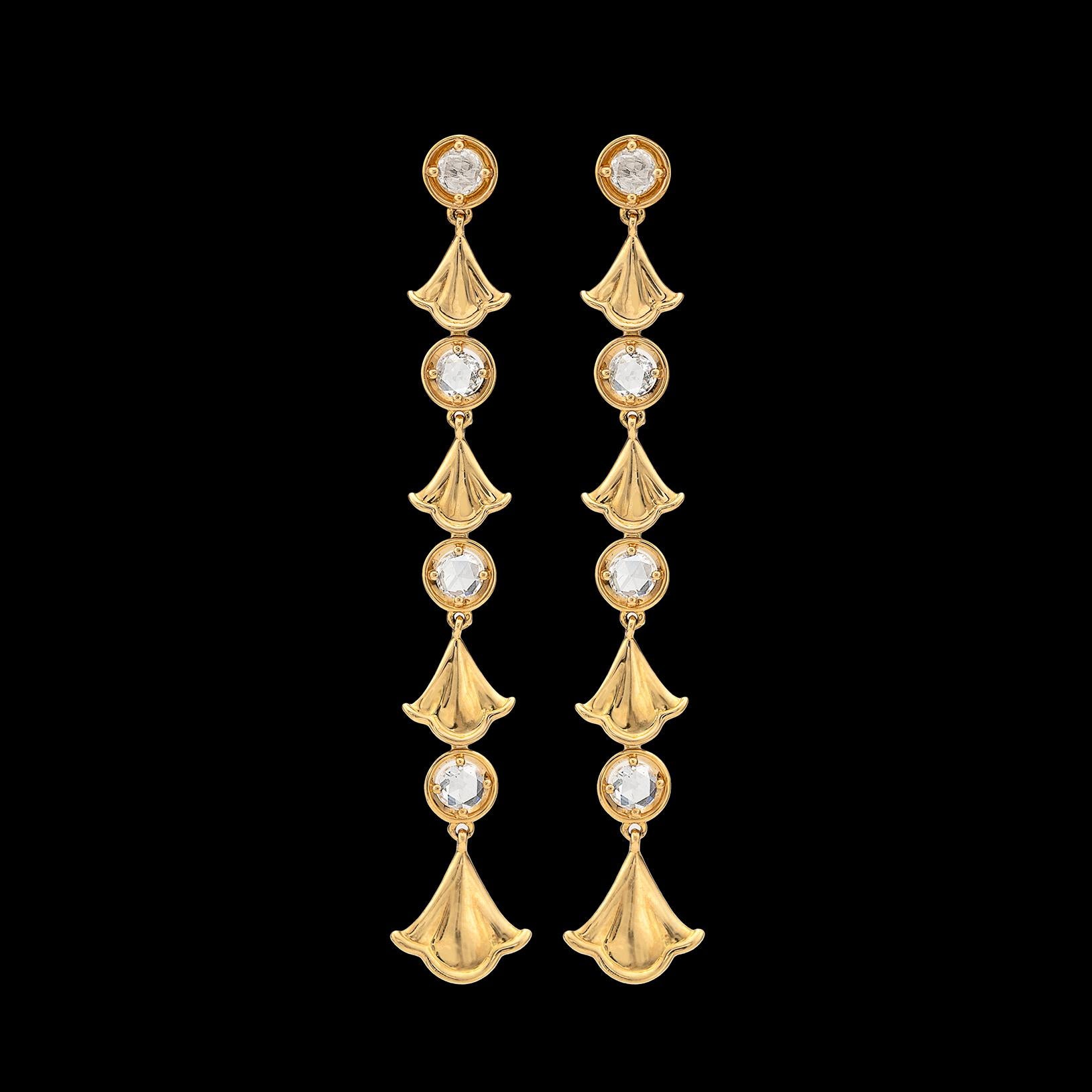These elegant drop earrings will accent any outfit! By Marina B. of the famed Bulgari family, the 18k gold drops are designed with ginko leaf links alternating with rose-cut diamond links, with a total diamond weight of 0.74 carats. The earrings