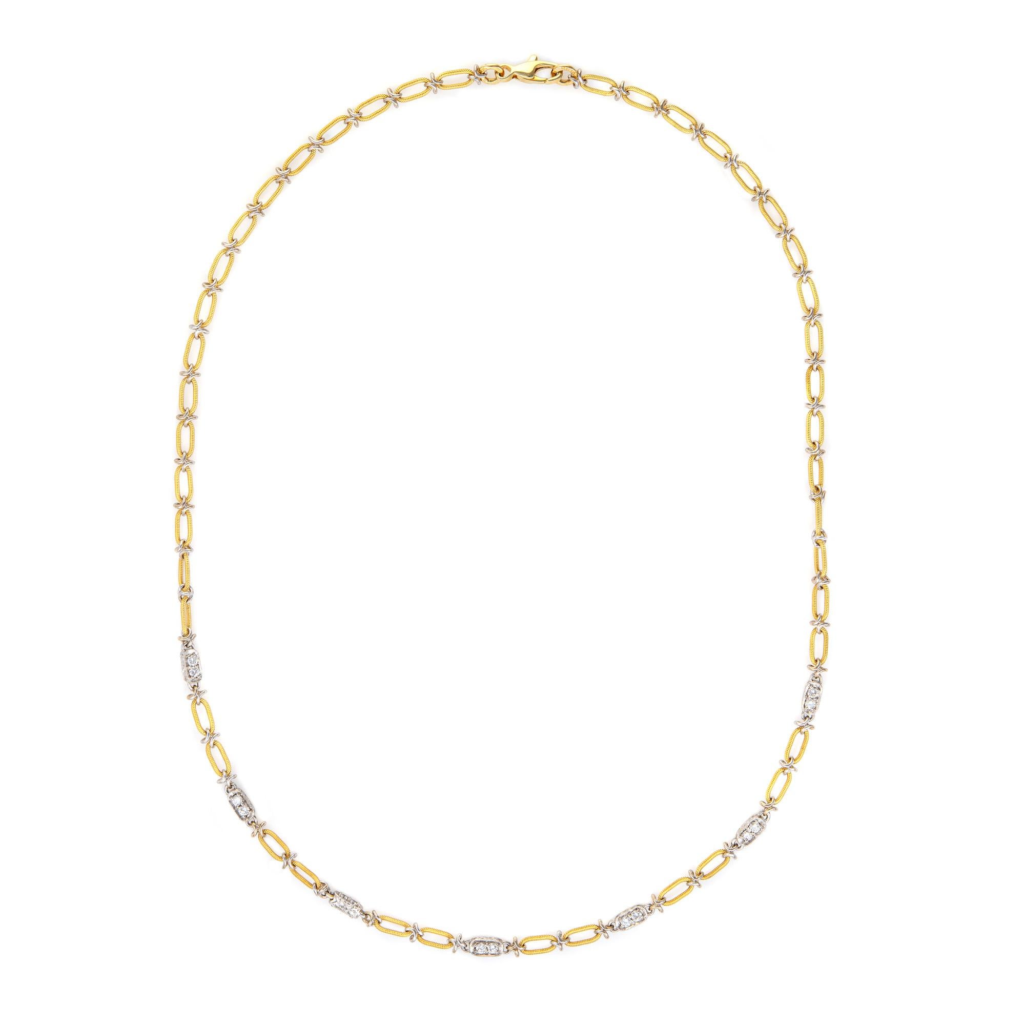 Stylish and finely detailed diamond necklace crafted in 18k yellow gold & platinum. 

Diamonds total an estimated 0.24 carats (estimated at H-I color and VS2-SI1 clarity).
The finely detailed necklace is crafted with 18k yellow gold oval links,