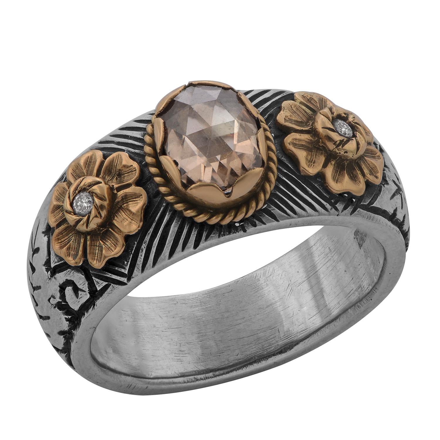 This is an exquisite one-of-a-kind diamond ring. Handmade in our workshops, it features beautiful Mughal Art engraving work. This is a highly specialized technique of hand engraving work. In this ring there are leaf and floral motifs, both in 18k