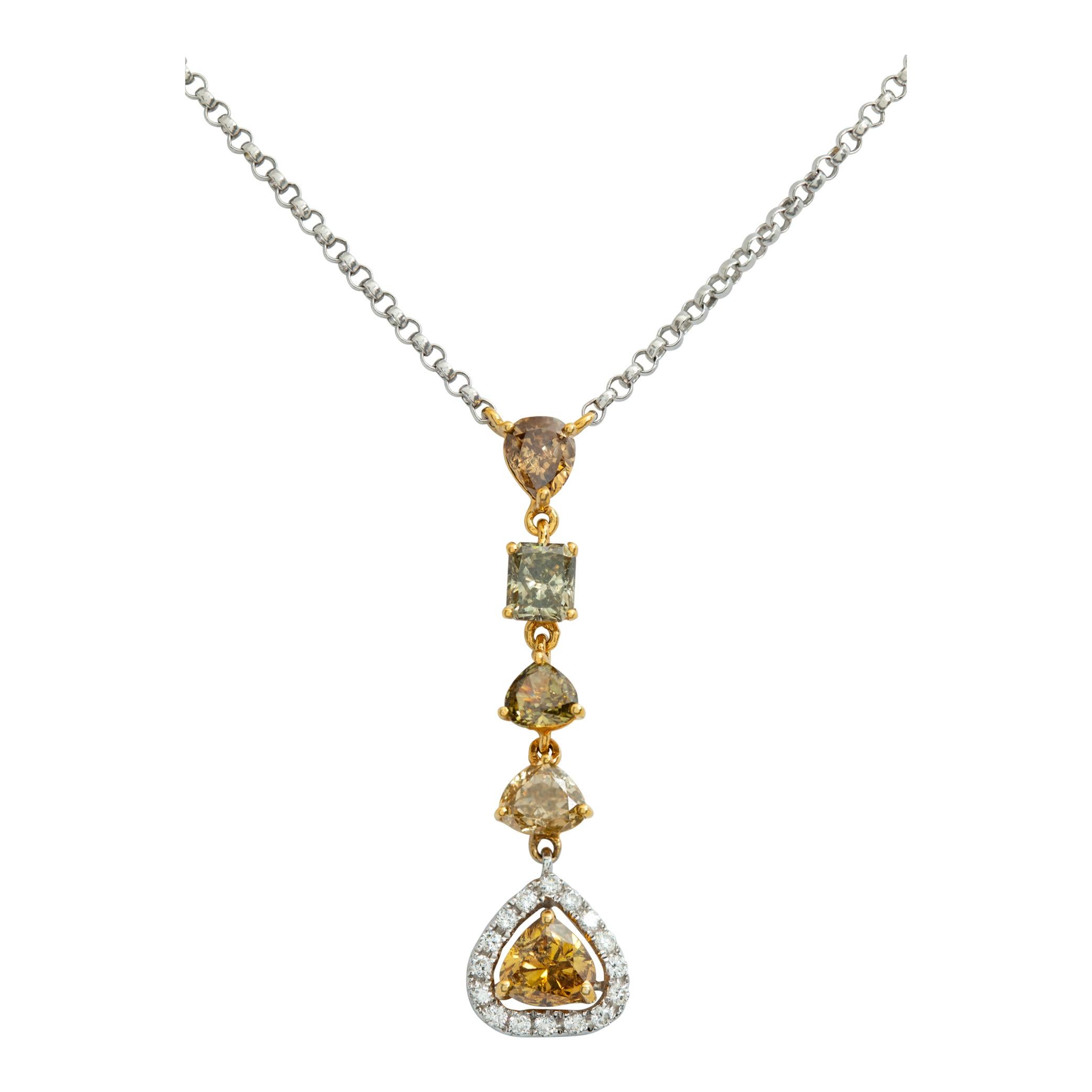 Diamond necklace in 18k white and yellow gold with 1.85 carats in fancy yellow diamonds and 0.22 carat in round brilliant cut diamonds. Length 16 inches, pendant drops 1.2 inches.