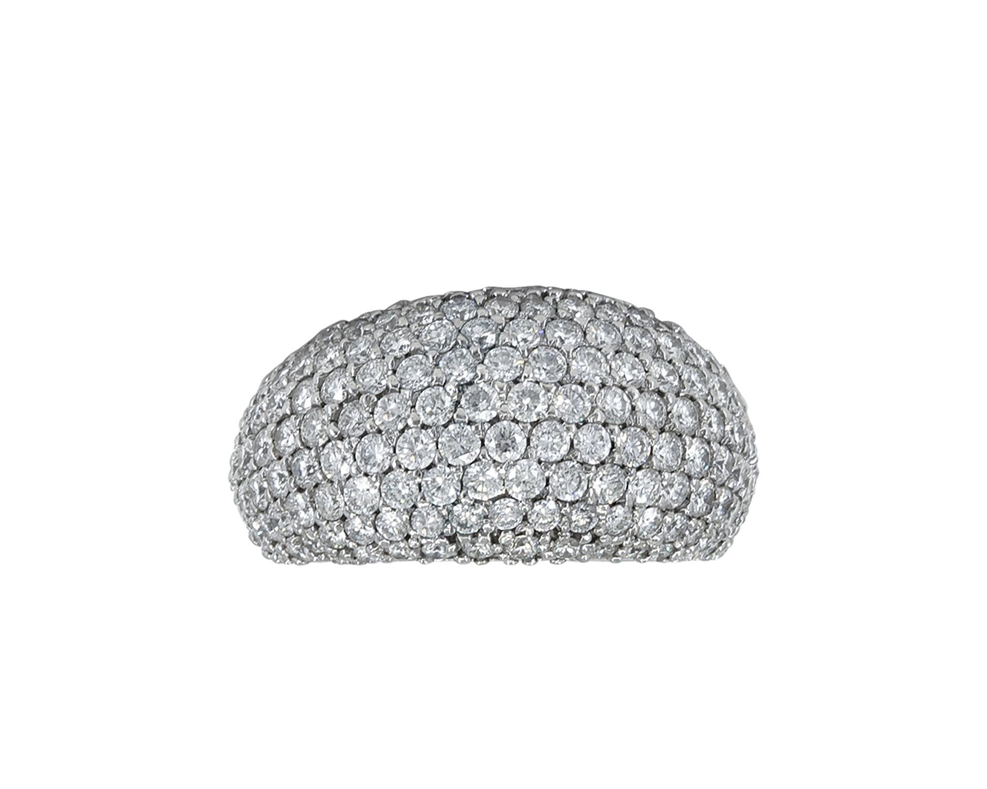 An elegant ring designed as a dome and embellished with 151 round diamonds. 
Total weight of diamonds is 5.30 carats.
The metal is 18k white gold. Gross weight 14.96 gr.
Size 7.5. Resizing available.