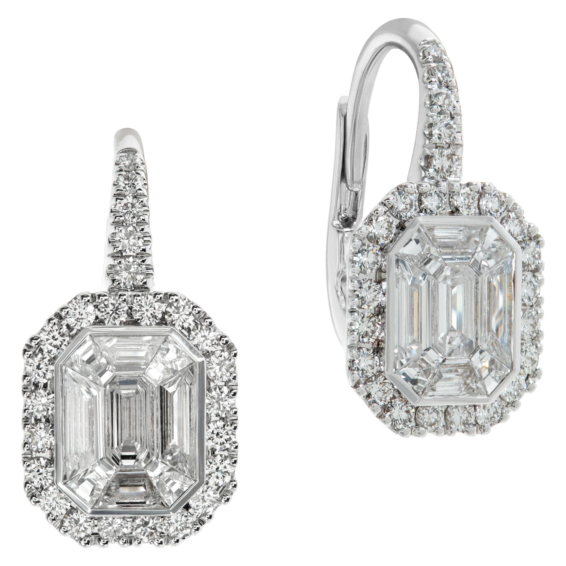 Illusion set diamond earrings in 18k white gold with 1.53 carats in round, baguette & trapezoid cut diamonds (G-H Color, VS Clarity). Earrings meassure 0.75 in. x 0.35 in.
