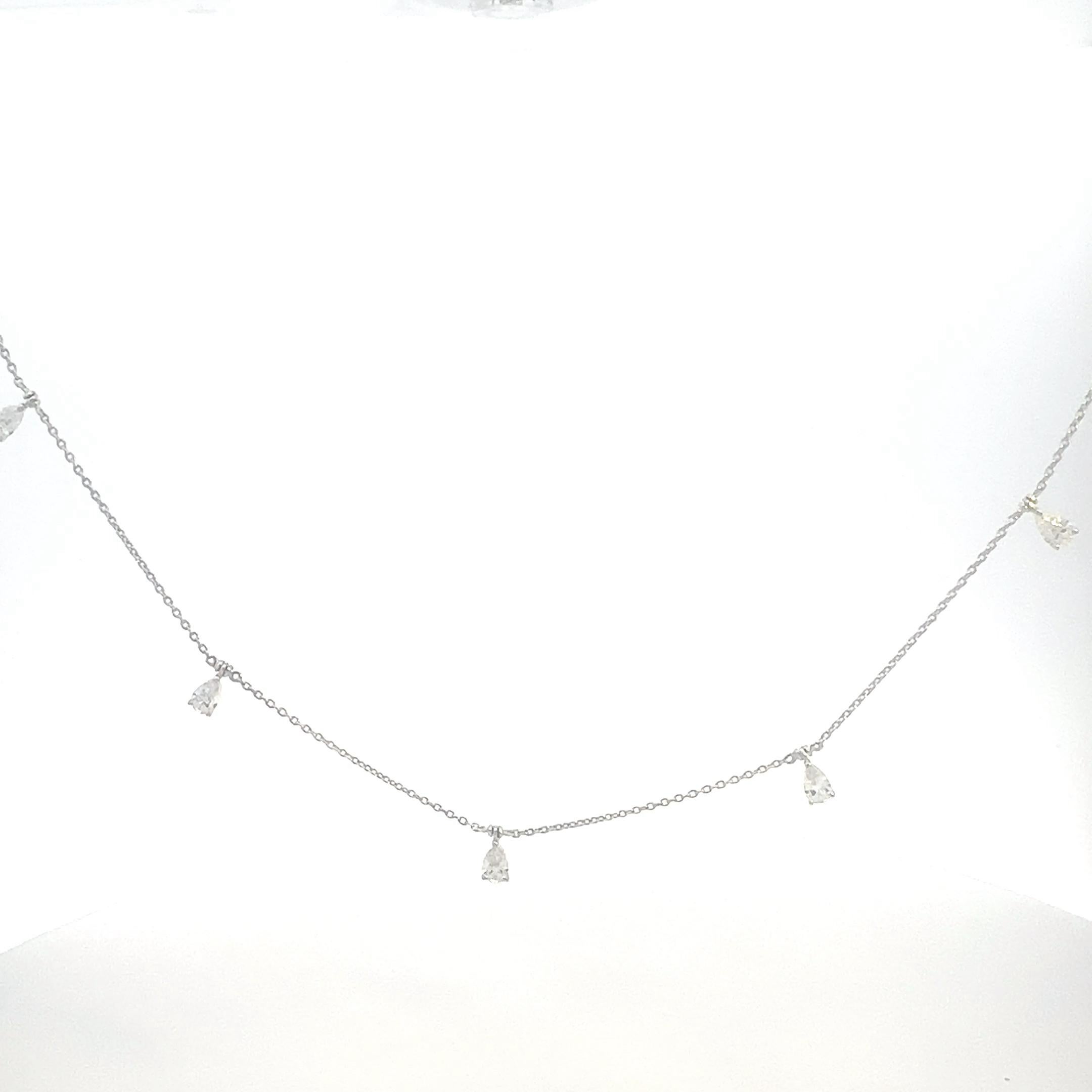 Necklace

18K White Gold

Weight -2.63 GMS,

Pear shape diamonds -5/0.67 ct

Length 42CM

This 18K White Gold Choker Necklace, weighing 2.63 grams, features a stunning pear-shaped

diamond, totaling 0.67 carats. With a length of 42 centimeters, this