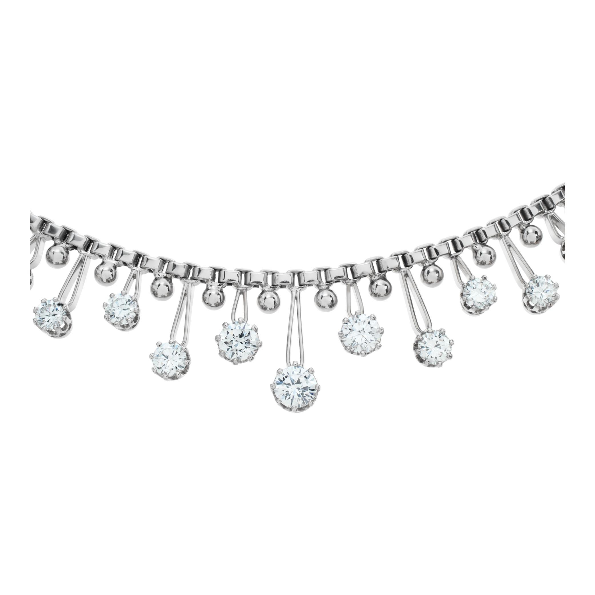 Diamonds necklace in 18K white gold. Round brilliant cut diamond total approx. weight: 7.00 carats, diamonds estimate: G-H Color, VS Clarity.  Front hanging length: 0.50 inch. Total length: 17.50 inches.