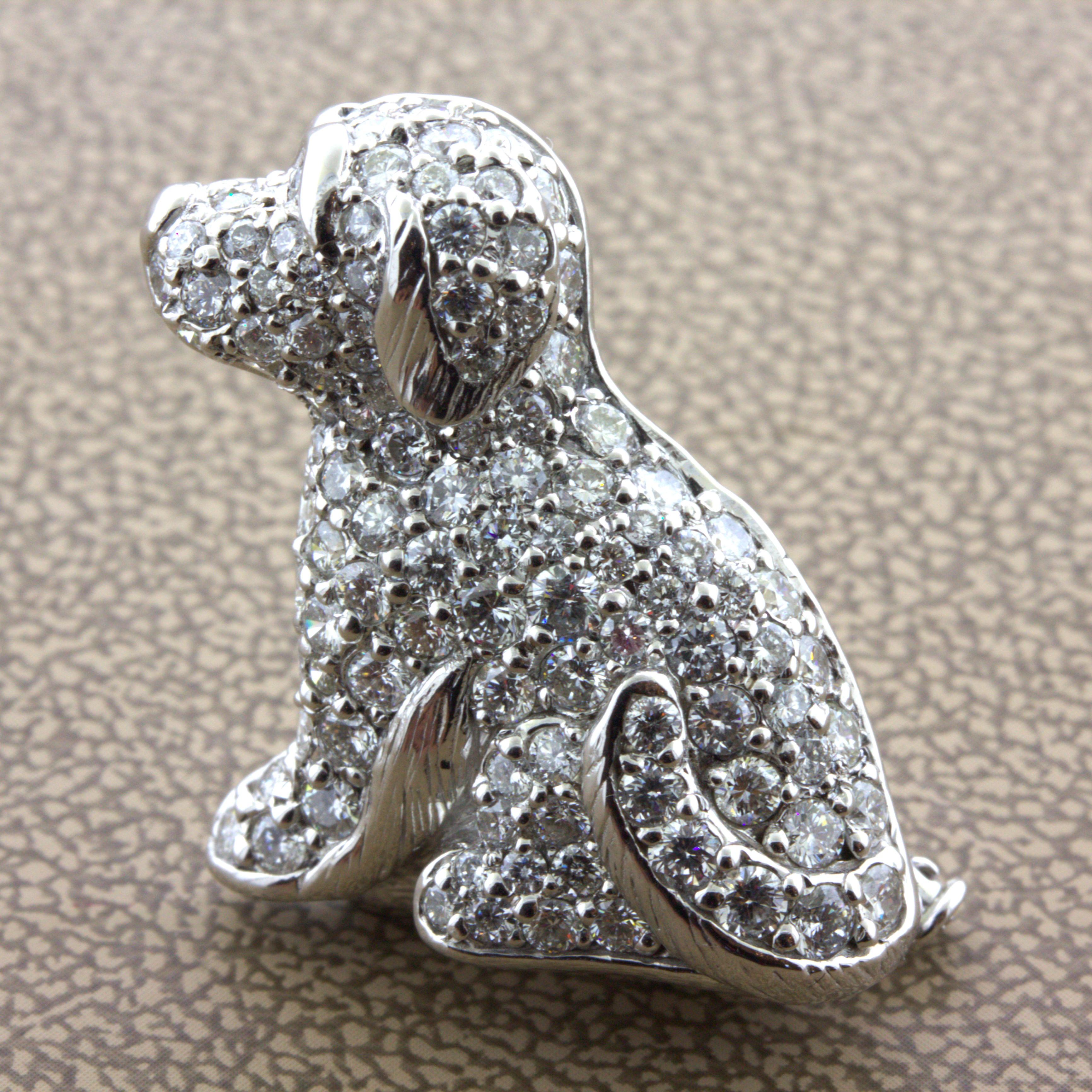 A sweet and adorable little puppy dog studded in diamonds! The piece features 2.47 carats of round brilliant-cut diamonds which are set across the entirety of the piece. The dog’s ears, tail, and legs are all detailed by hand-etched work for added