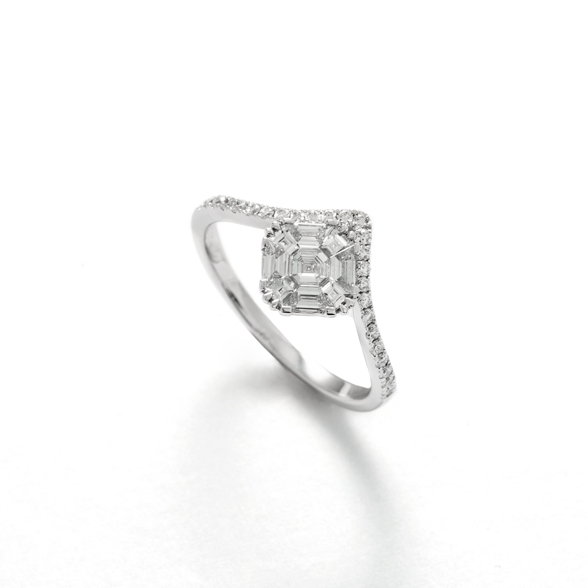 9 natural diamonds of 0.41 carat total and 25 natural diamonds of 0.17 carat total. G color, Si1 clarity on 18K white gold mounting.


