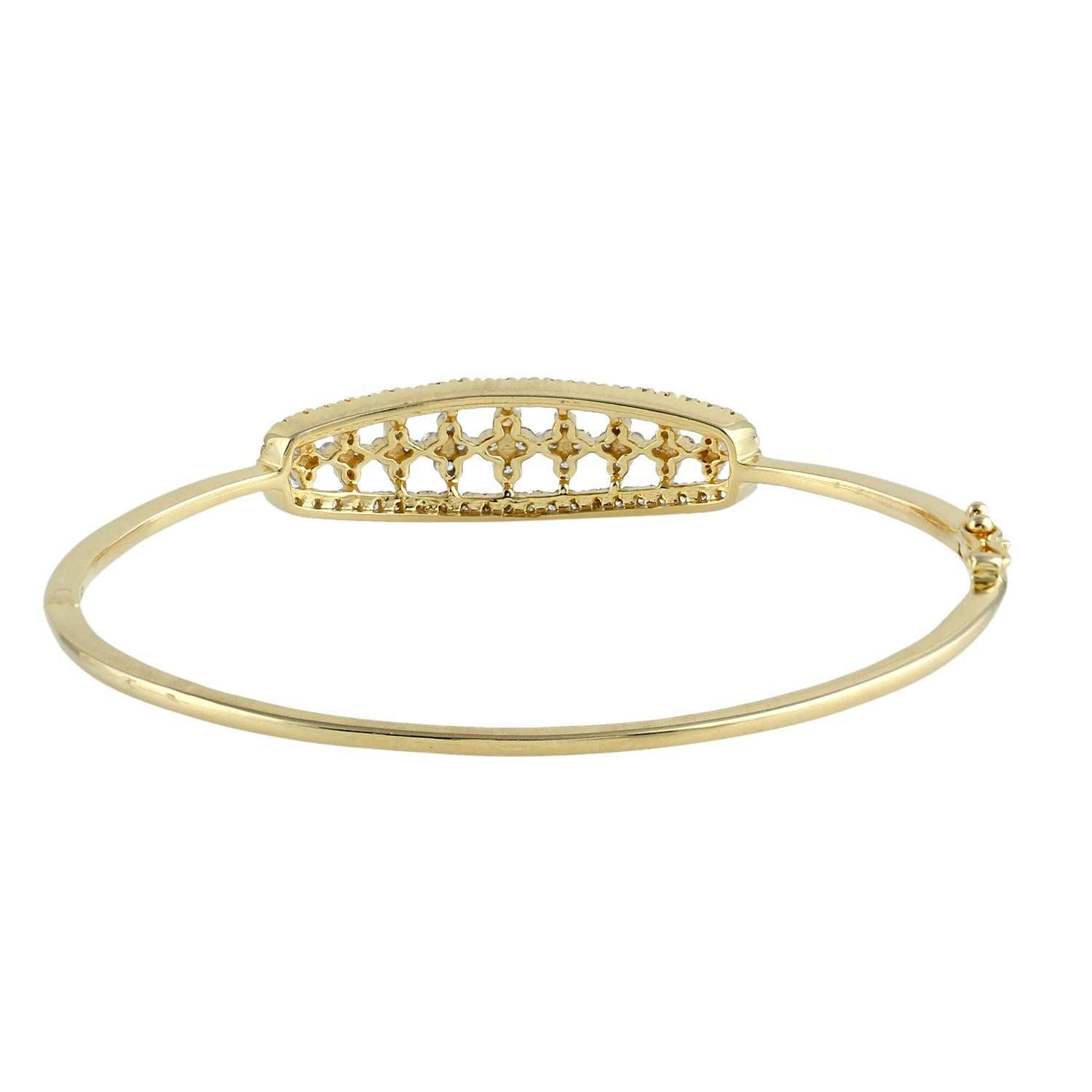 Everyday wearable designer diamond oval shape bangle in 18K Yellow Gold is just lovely.

18K Gold: 10.415gms
Diamond: .96cts
