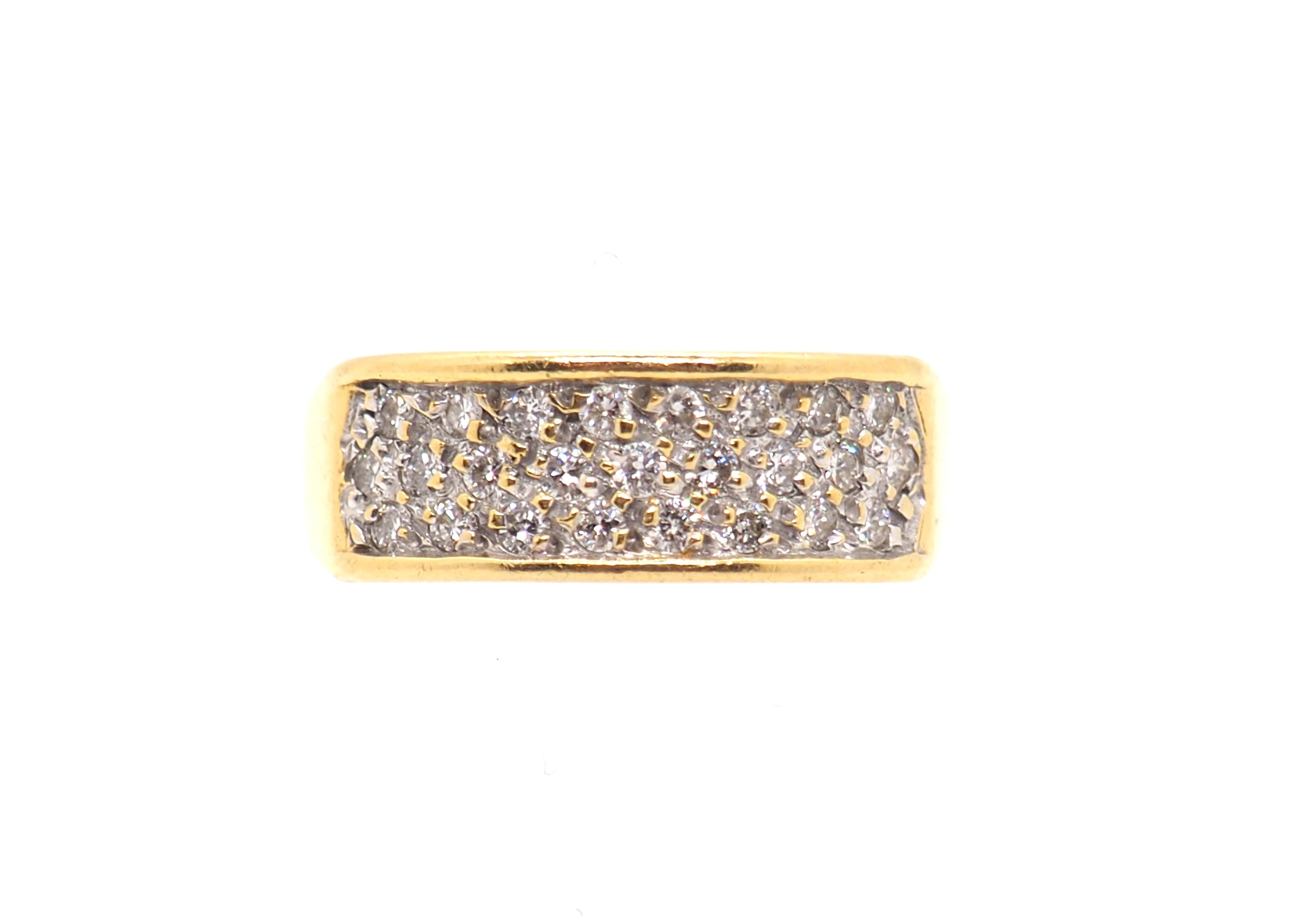 Elevate your style with our exquisite 18k yellow gold ring, adorned with 24 shimmering round cut diamonds totaling approximately 0.24 carats. This ring exudes elegance and sophistication, making it the perfect accessory for both everyday wear and