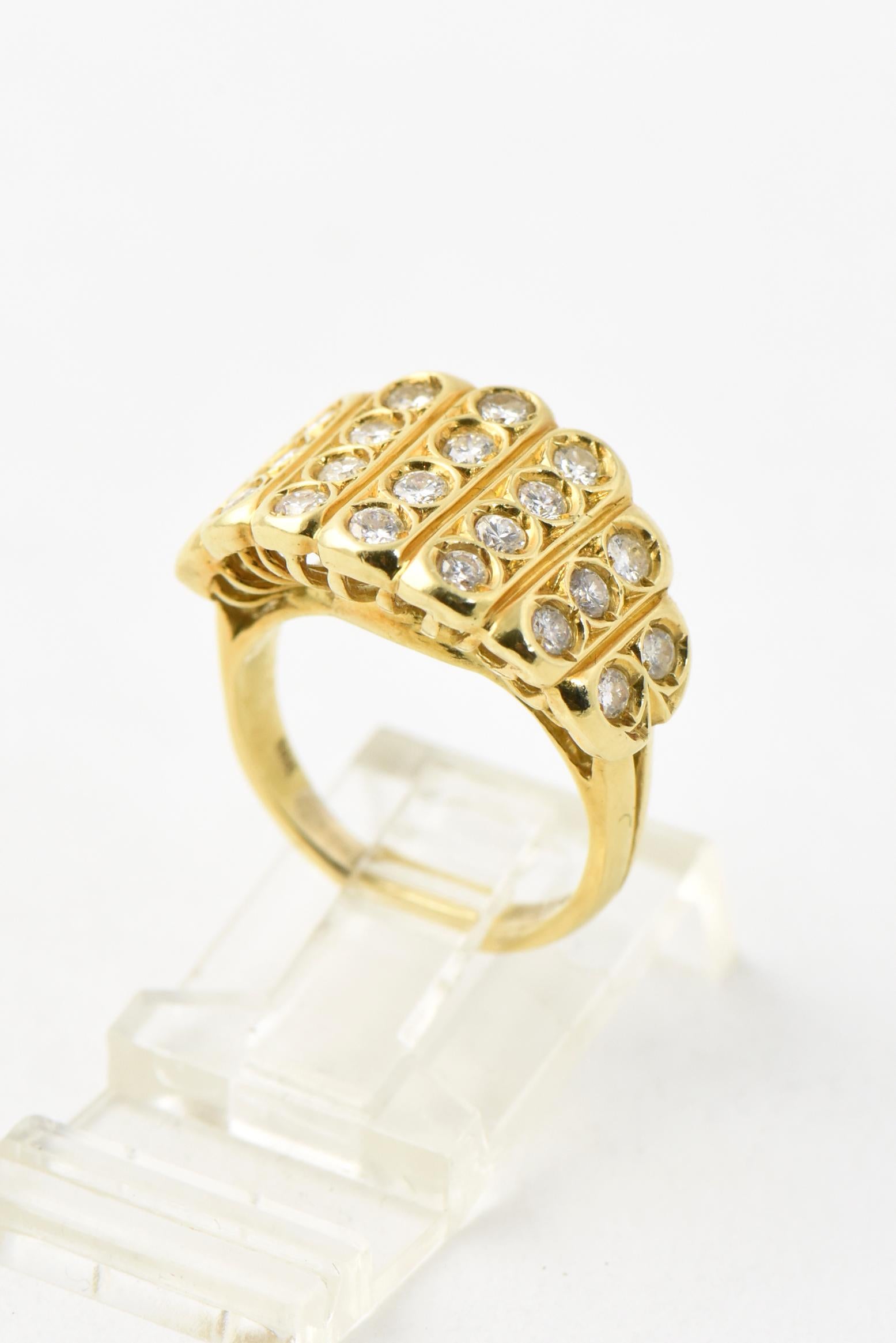 Beautifully made 18K yellow gold and diamond ring with seven columns of fine quality bezel-set diamonds that graduate towards the middle. Approximate diamond weight is 1.10c of G-H, VS-SI stones. Marked 18K. US size 4.5; can be resized.