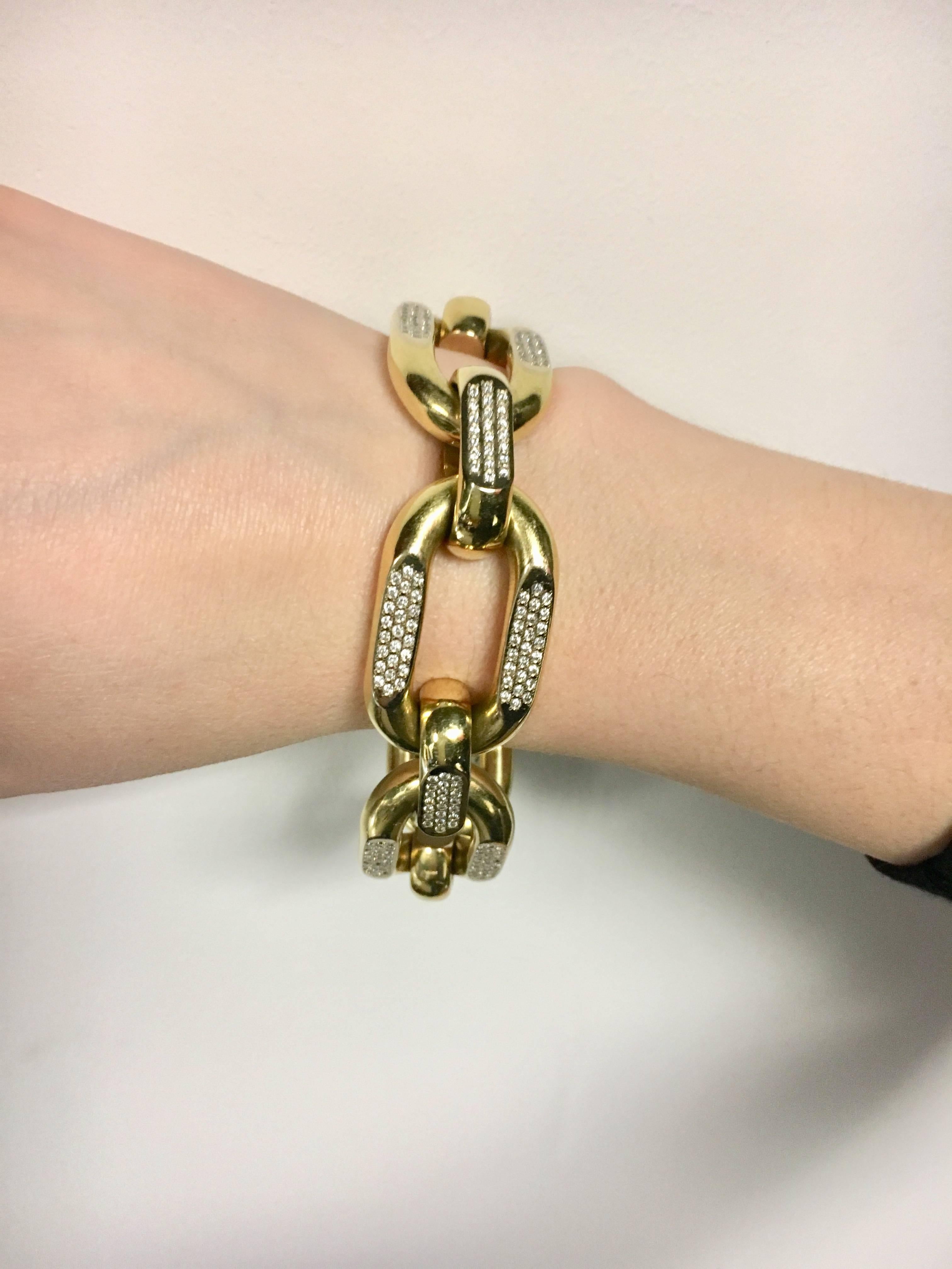 One pre-owned 18kt yellow Gold Link Bracelet, contains 363 custom set rounds diamonds, 3.63t.w. VS-SI clarity, G-H Colour,  Bracelet weighs 80 Grams and is a statement piece.