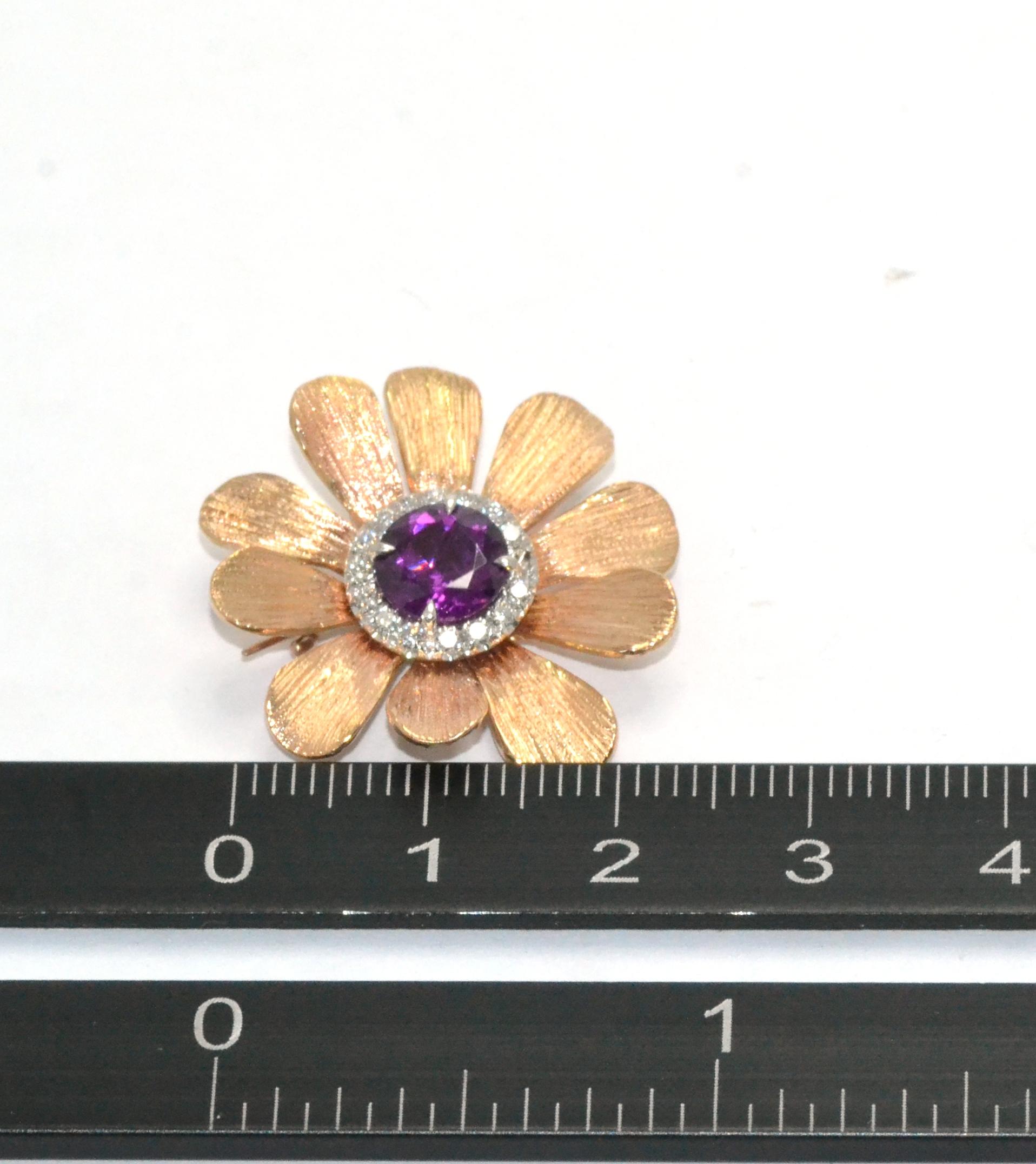 The Happy Flower brooch is a versatile jewel that had been handcrafted in Margherita Burgener family workshop, Italy.
Beautifully engraved by burin, each petal looks like real flower.
Pink gold matches perfectly the purple of the central stone, a