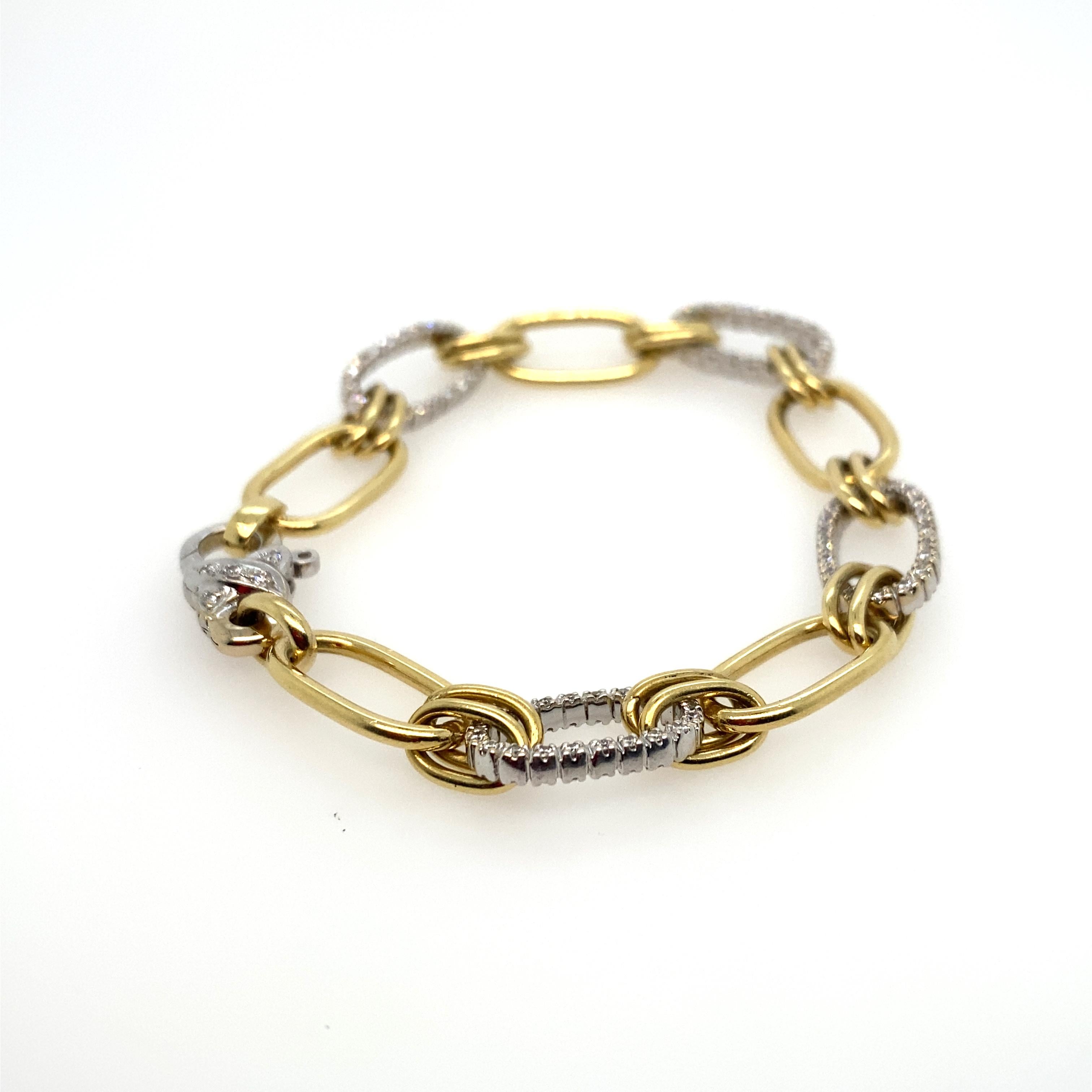 Fabulous Asprey and Guldag made 18kt two-tone diamond link bracelet.  This stunning link goes with just about everything!  Can be worn with yellow or white gold jewelry.  Links are a  classic look that never go out of style.  What also makes this so
