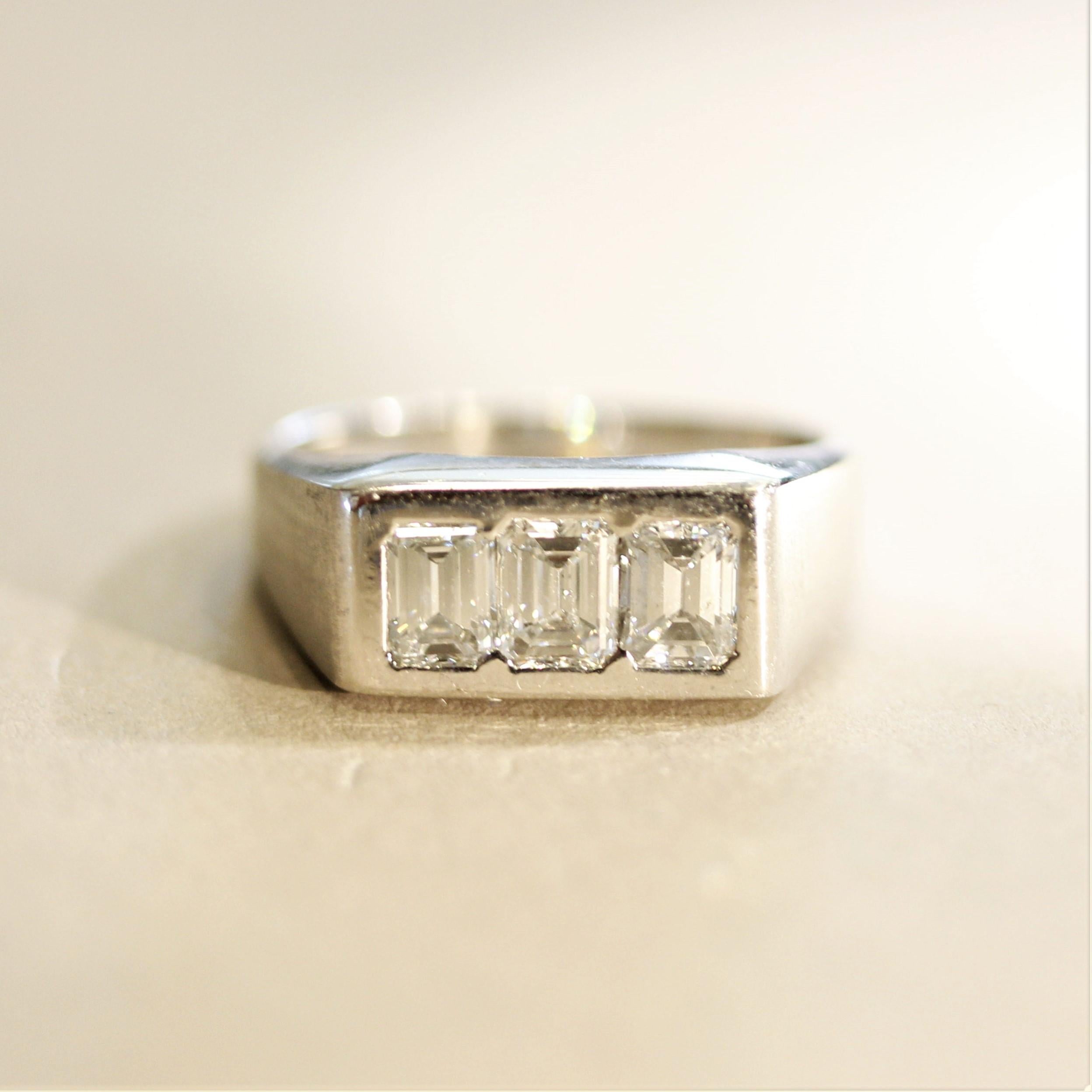 Simple yet fine and stylish! This gold ring features 3 fine emerald-cut diamonds weighing a total of 1.50 carats, about half-a-carat each diamond! Set side by side and flush with the top of the piece, this ring can be worn every day without the
