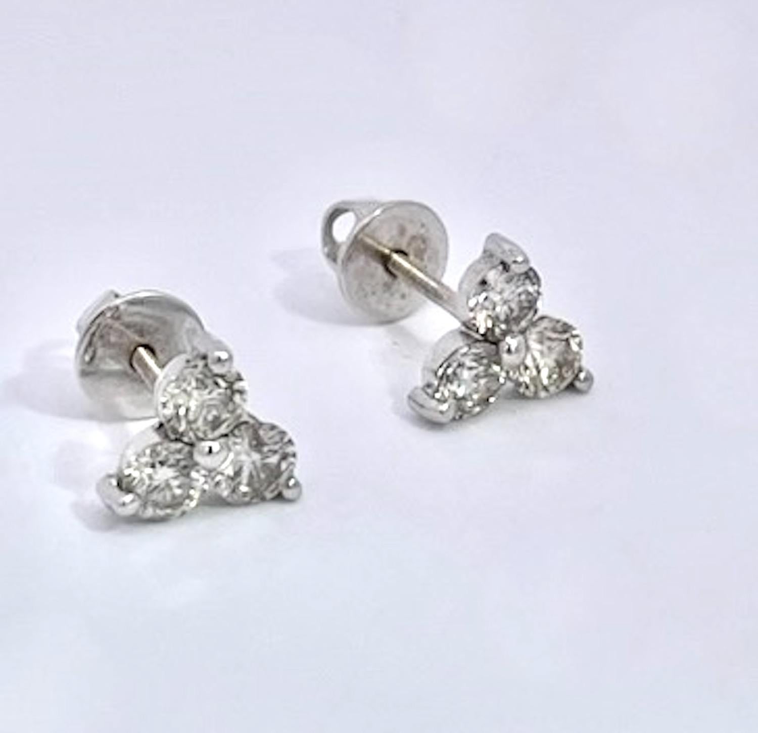 I had these earrings made about 7 years ago and just loved them as I could travel wearing them and not take them off during my trip.  These earrings consist of 3 modern cut Diamonds of approximately 0.25 points each for a total of 0.75 carats each