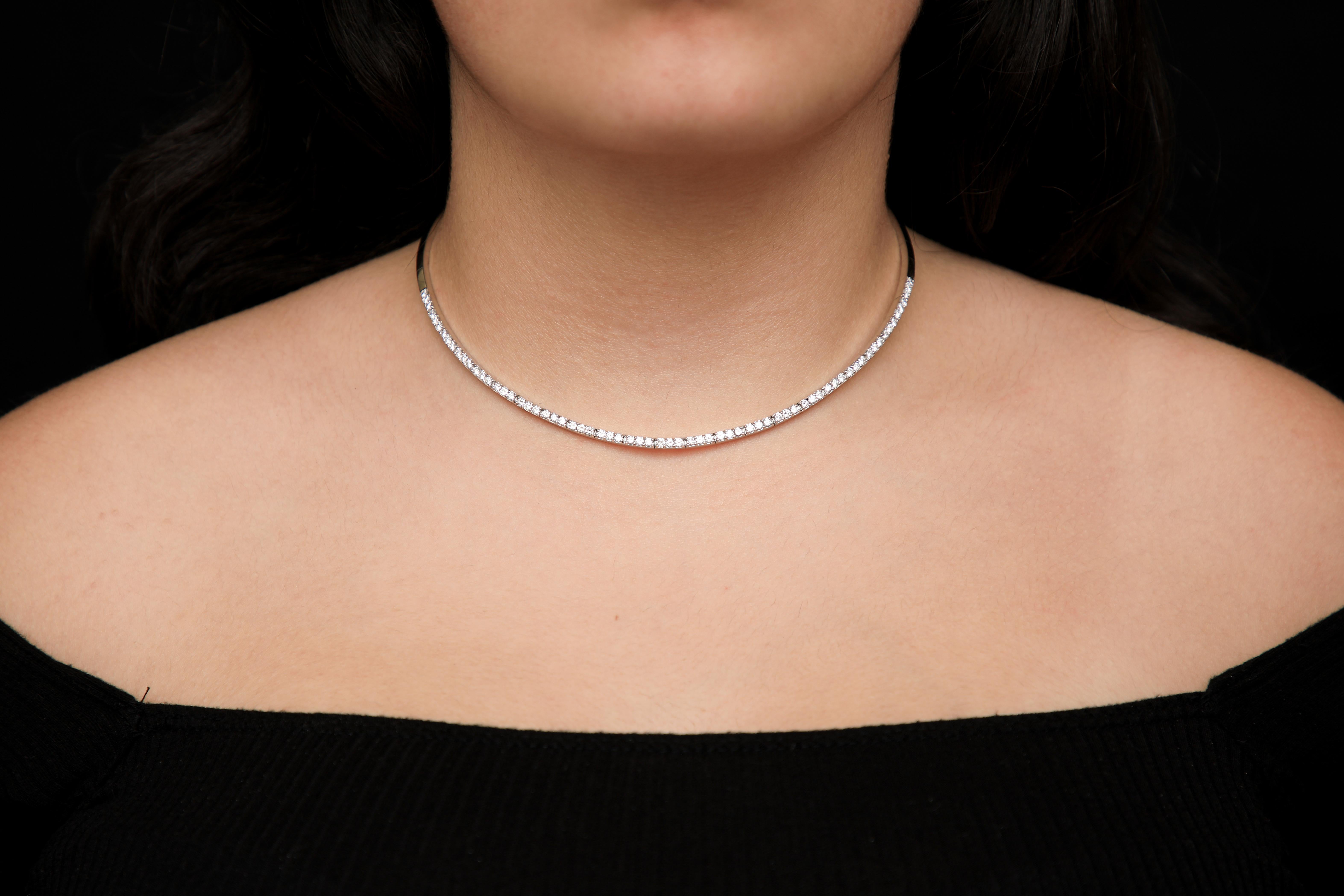 Diamond 4.01 Carat Rivière Line Choker Collar Necklace

Stunning collar style diamond Riviére, line necklace comprised of solid 14k white gold equaling to 29.5 grams. The fabulous creation is all handmade with fine craftsman ship. All the little