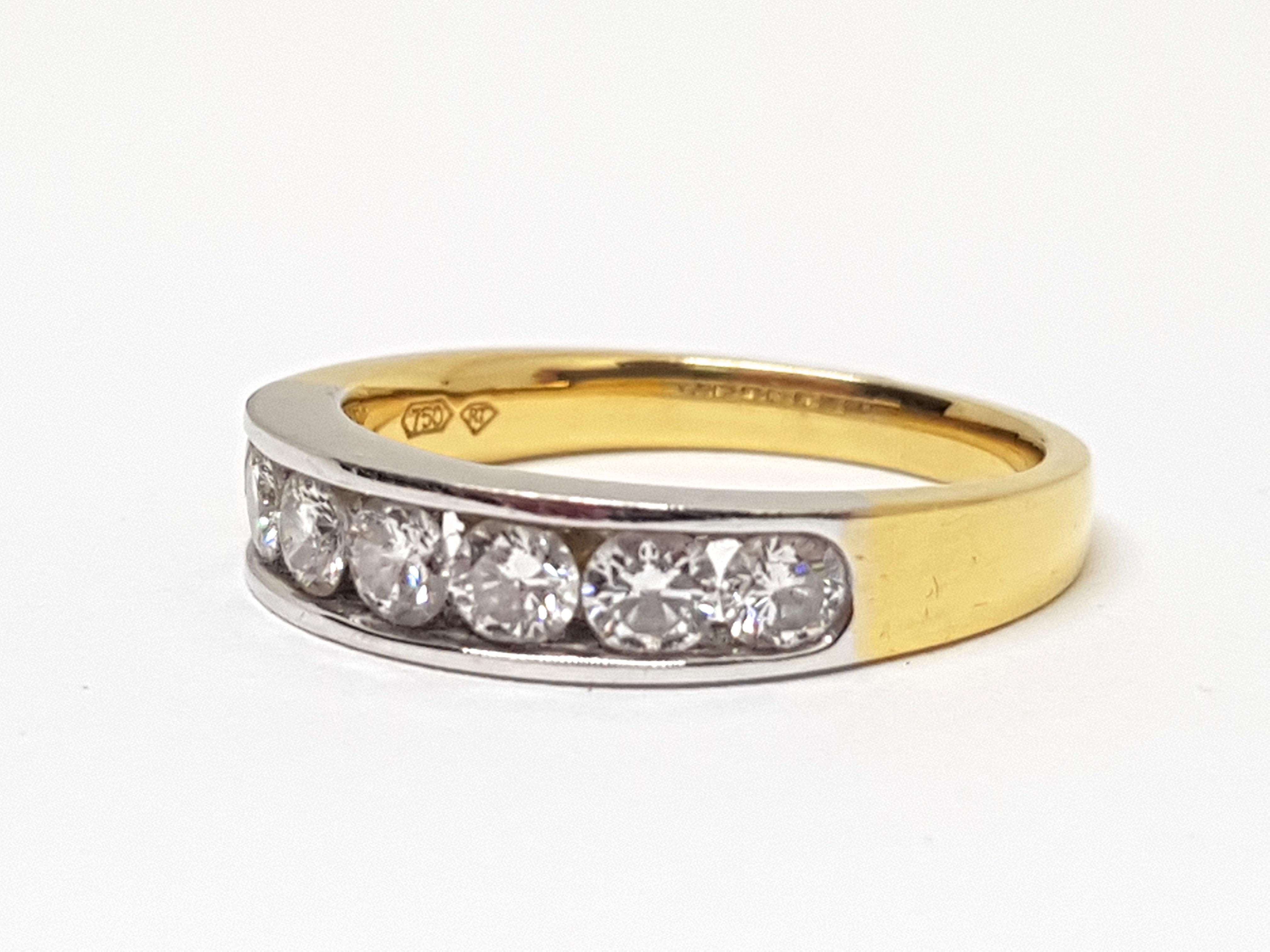 Round Cut Diamond 7-Stone Gold Memory Ring