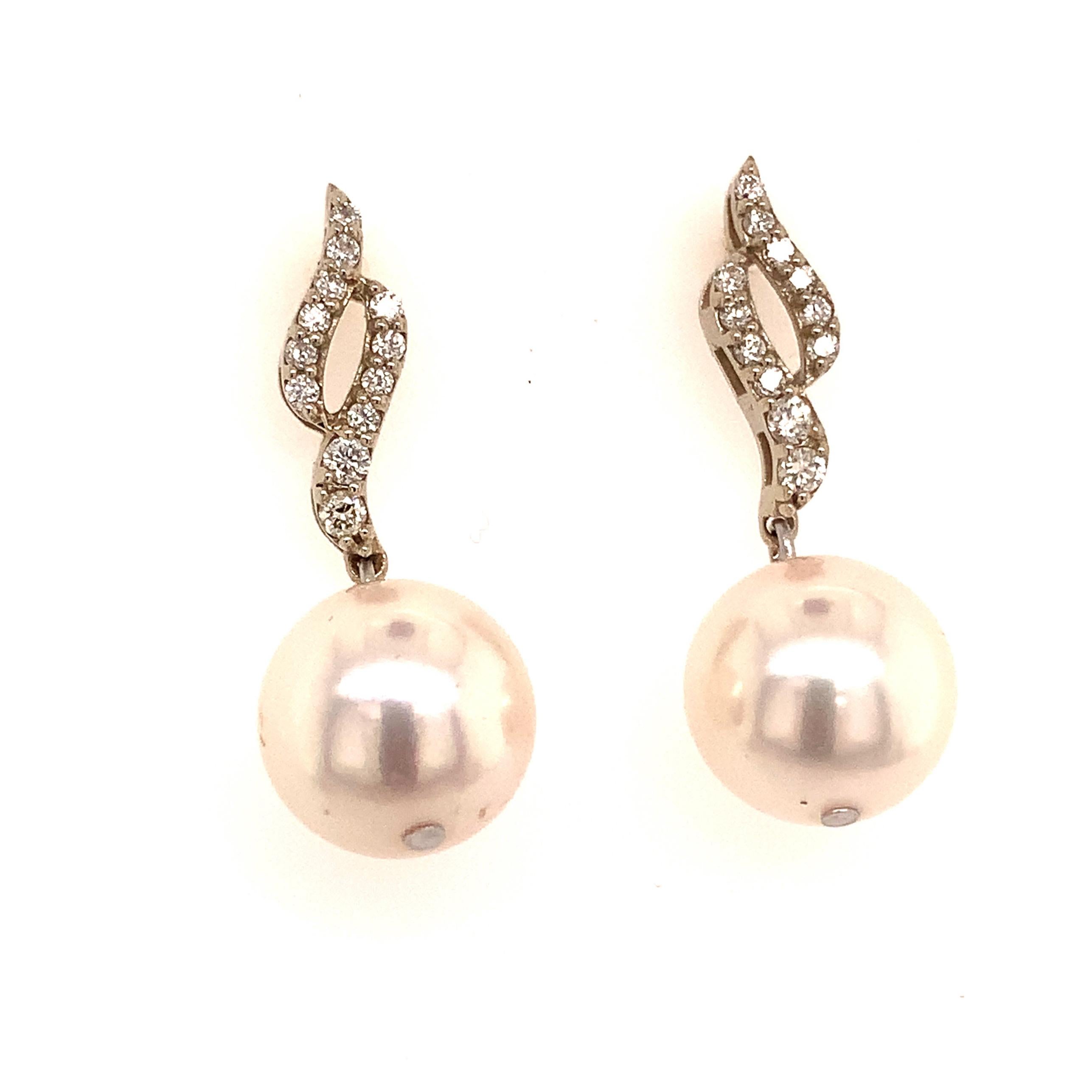 Fine Quality Akoya Pearl Diamond Dangle Earrings 14k Gold 9.2 mm Certified $1,990 114460

This is a Unique Custom Made Glamorous Piece of Jewelry!

Nothing says, “I Love you” more than Diamonds and Pearls!

These Akoya pearl earrings have been