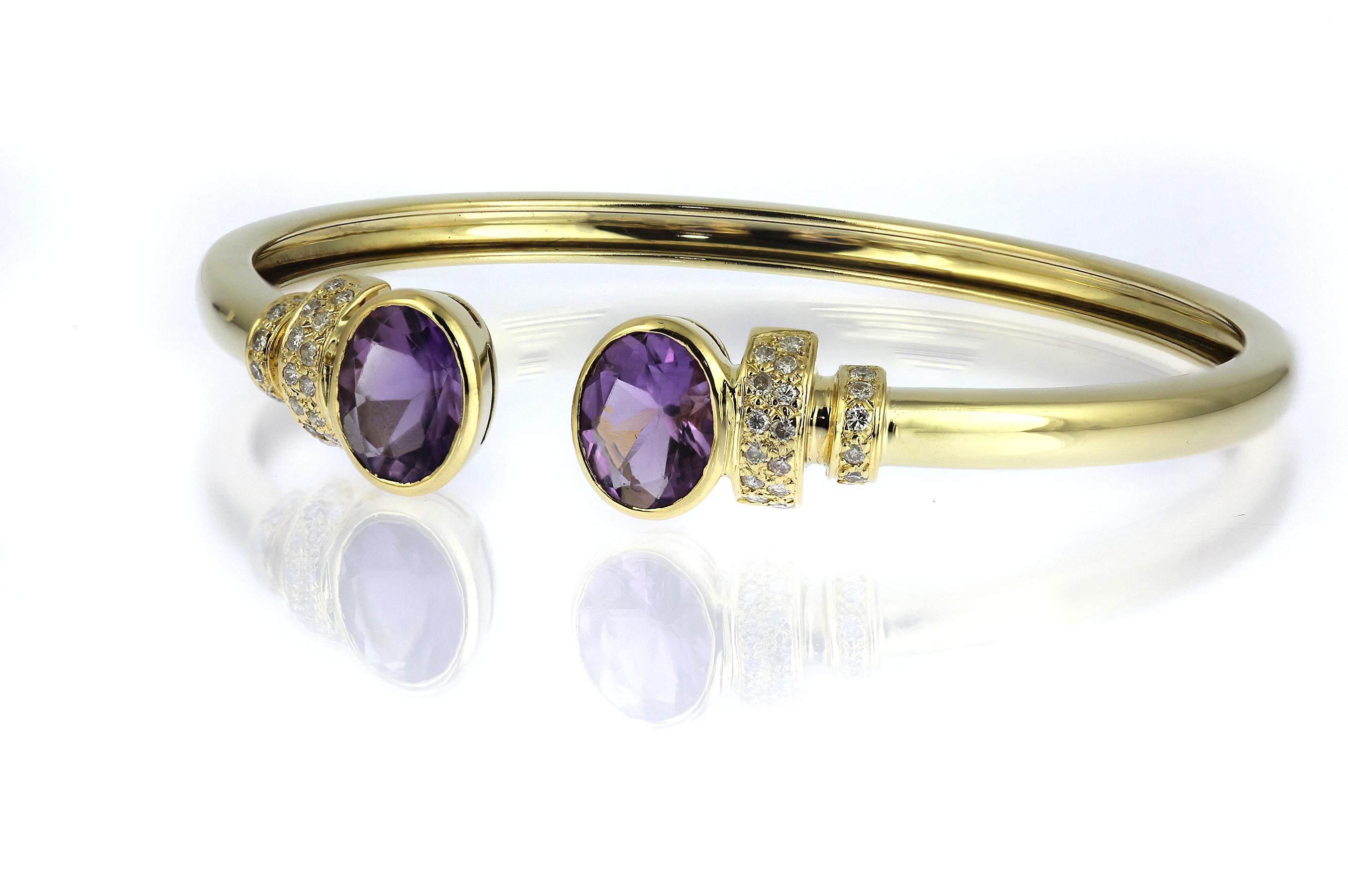 Diamond and amethyst set bangle set in 18-K yellow gold. The bangle made it flexible to twist open wide to wear. 
38x Round Brilliant -cut diamonds, total weight 0.38 carats, assessed colour H/I, assessed clarity VS/SI
2 x Oval shape faceted