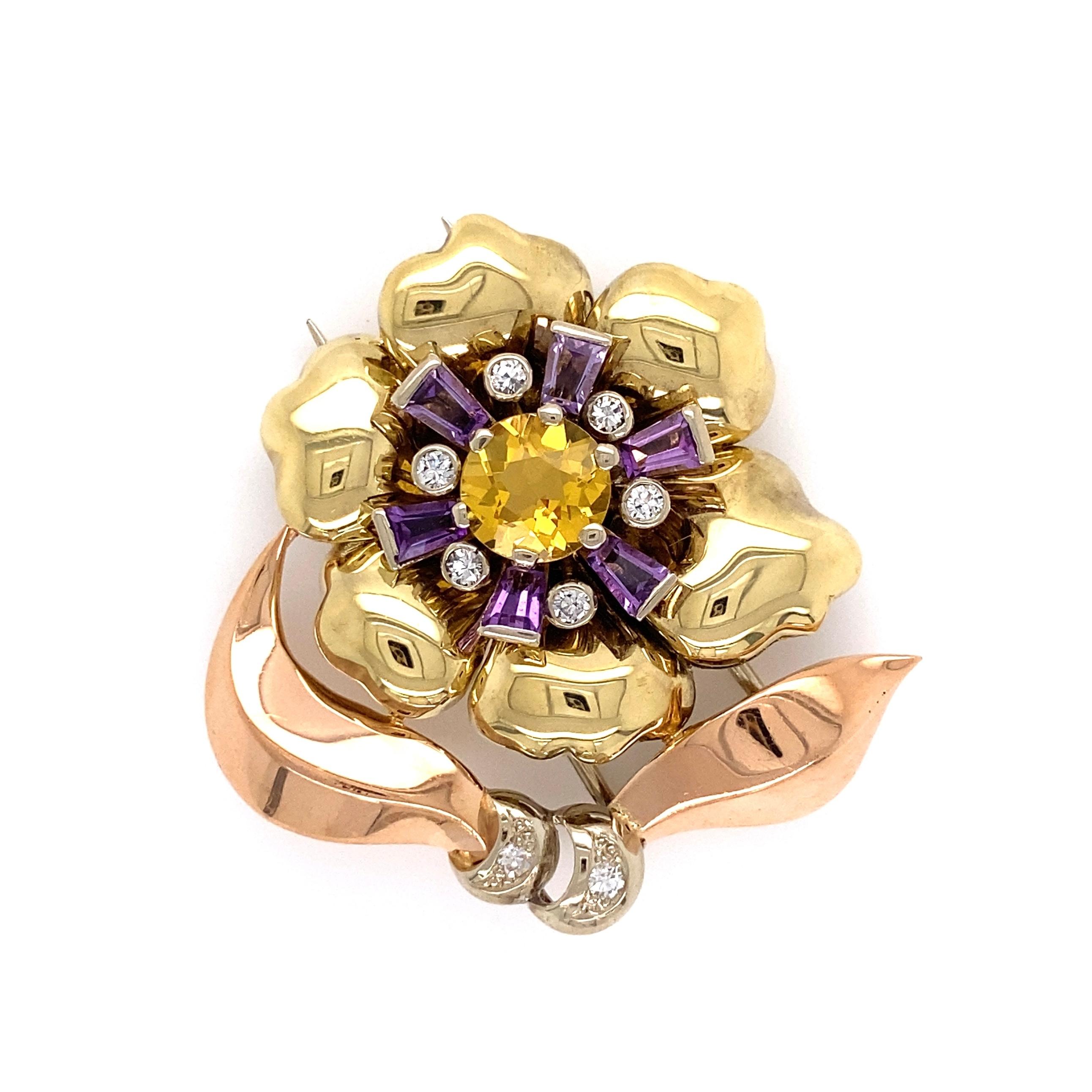 Simply Beautiful and finely detailed Retro Stylized Flower Design Gold Brooch Hand set with 8 Diamonds, approx. 0.35tcw, 1 Citrine approx. 1.15ct and 6 Baguette Amethyst approx. 0.50tcw. Approx. 1.25”H x 1.1” W. Hand crafted in 18 Karat Green and