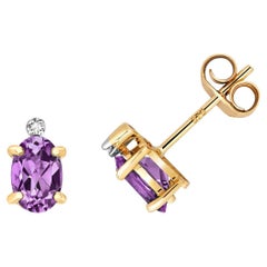 DIAMOND & AMETHYST OVAL CLAW SET STUDS IN 9CT Gold